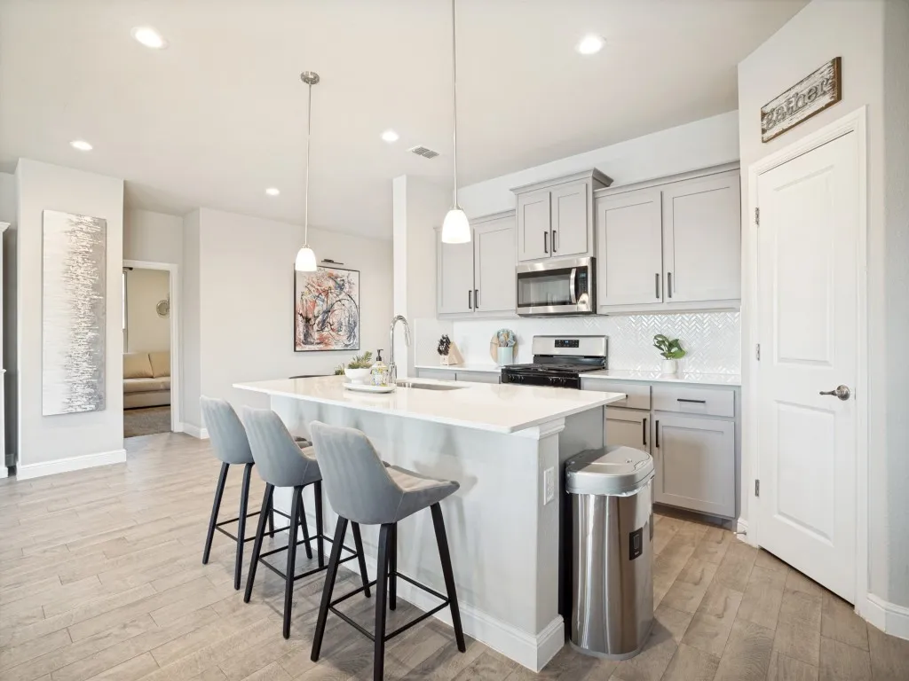 Central kitchen island with white countertop
