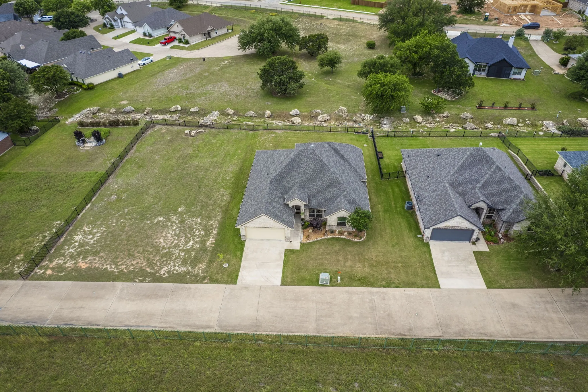 Aerial perspective capturing the home's rooftop and its place within the neighborhood.