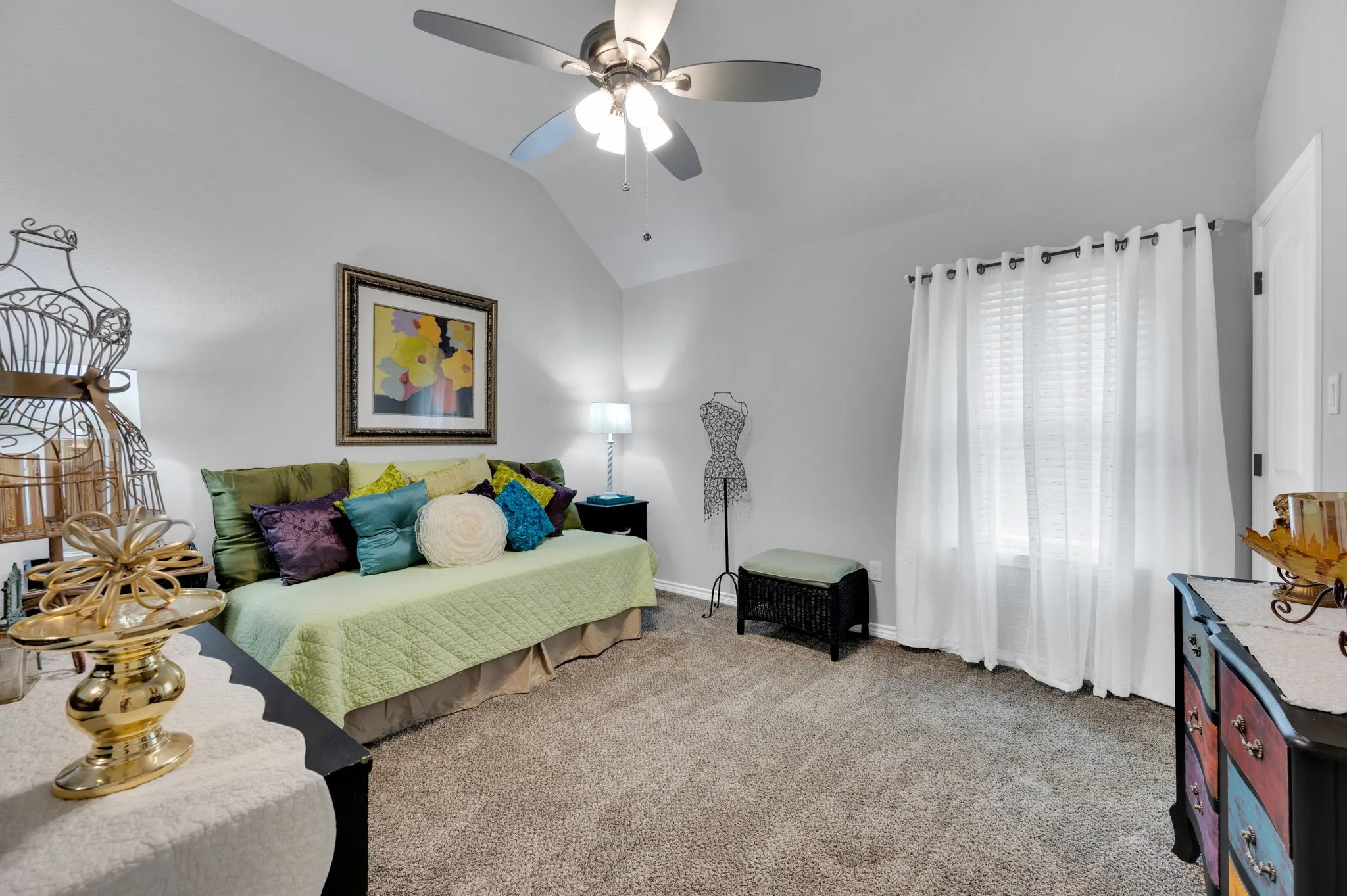 Fourth bedroom with a vaulted ceiling, perfect for a guest room, office, or playroom.