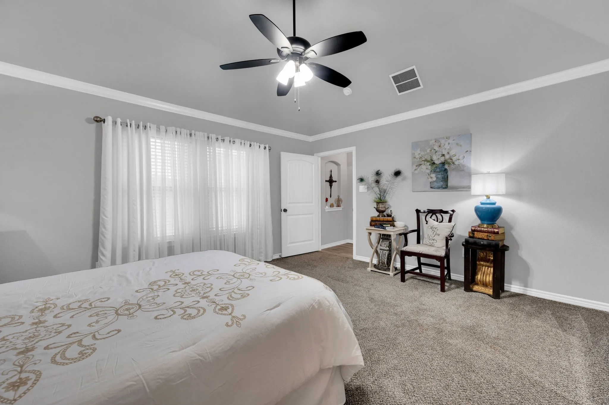 Generously sized primary bedroom with plenty of natural light.