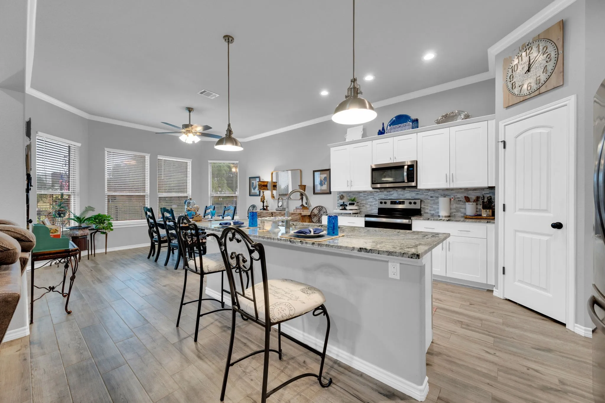 Bright kitchen with a breakfast bar overlooking the living area, perfect for entertaining.
