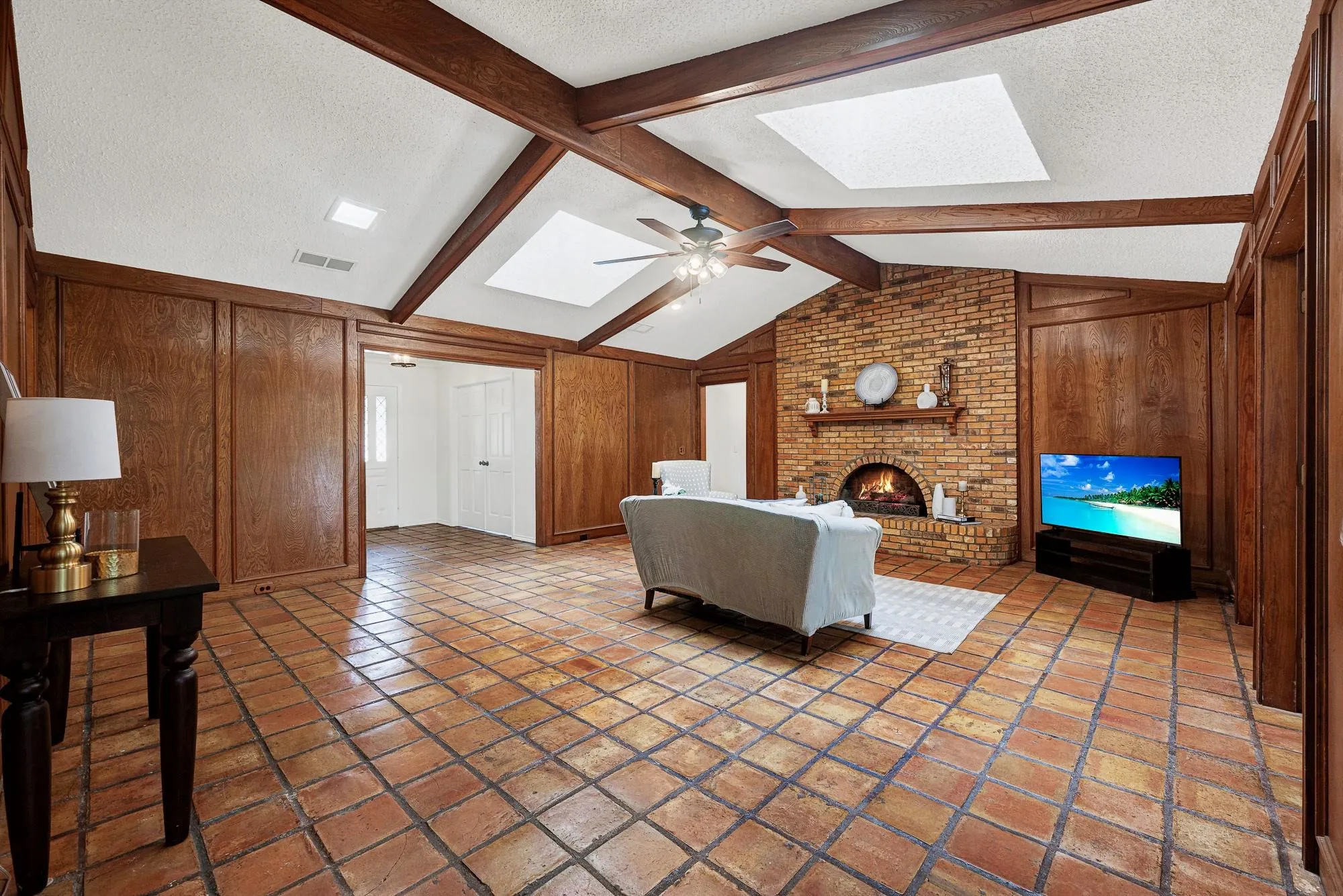 Vaulted ceiling with skylights to add natural light throughout the day.