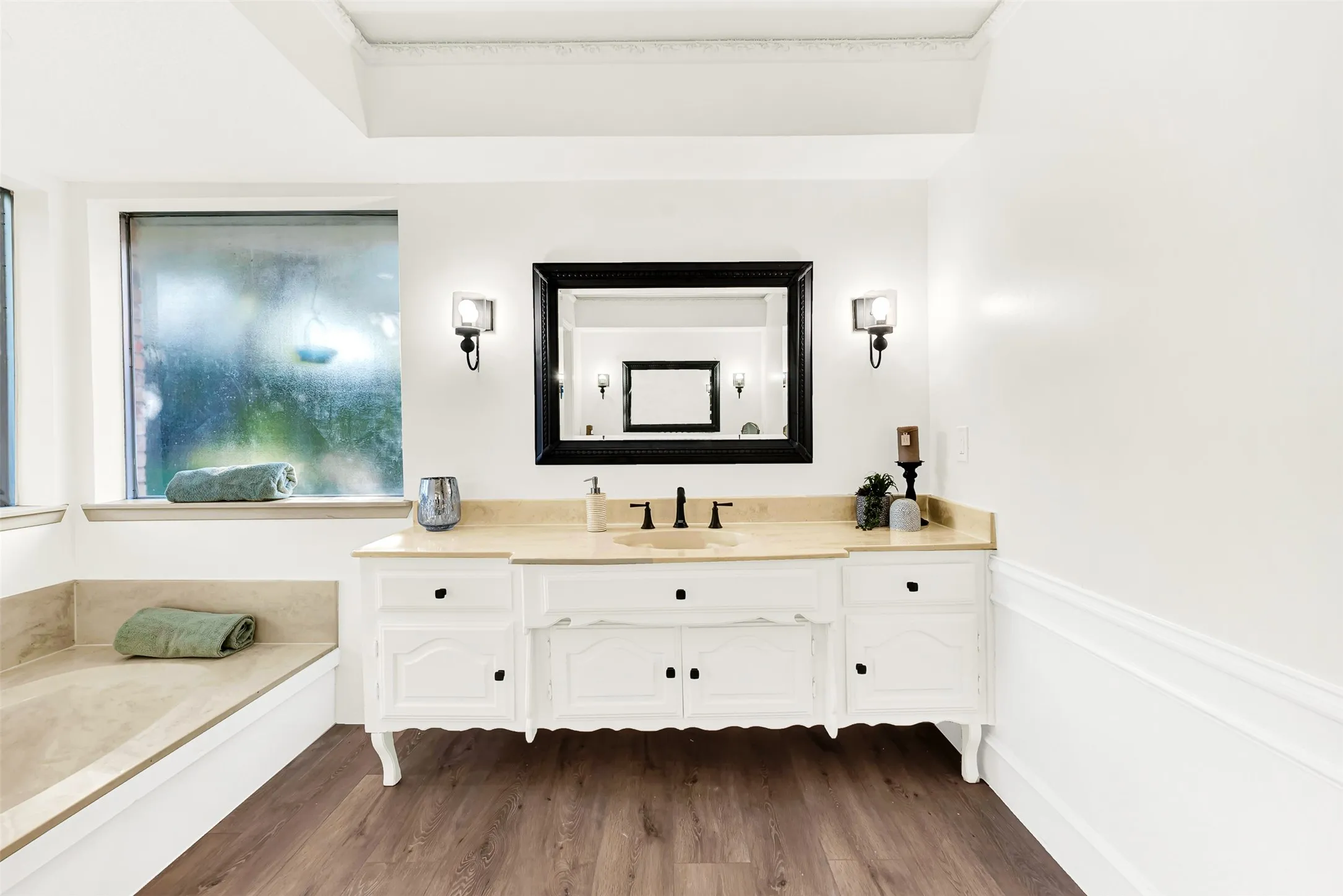 So much room to move in the primary bathroom, enjoy all it has to offer.