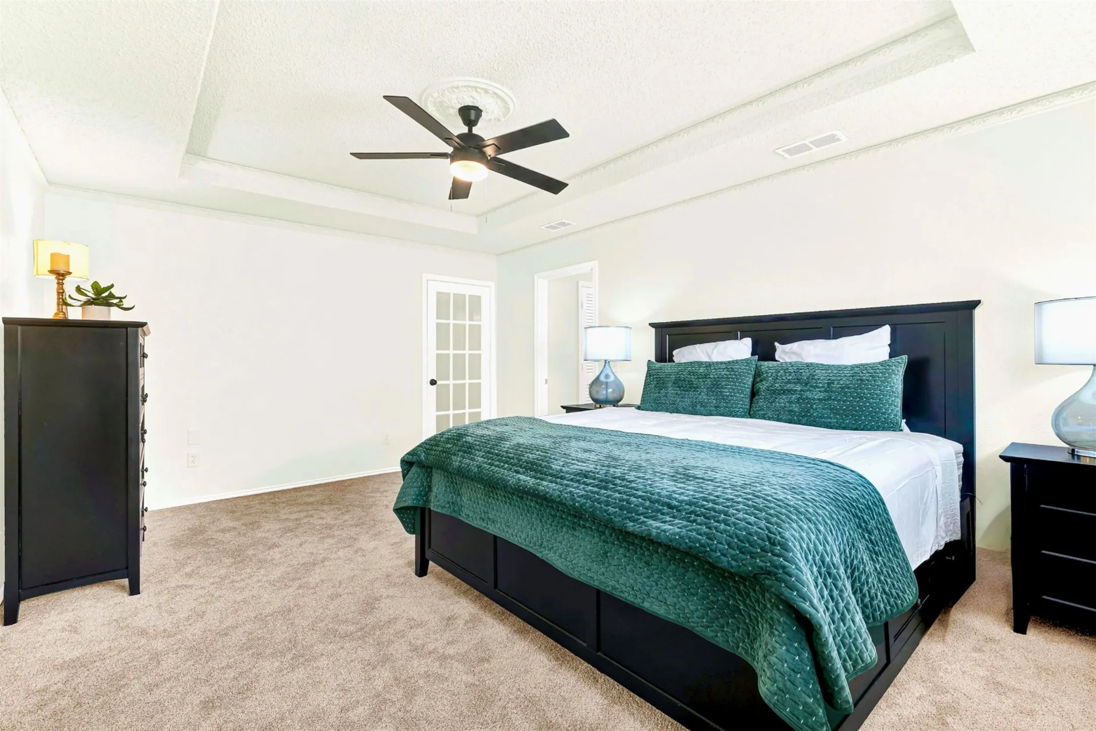 Ample natural light from large window walkout to sunroom. Large Primary suite.