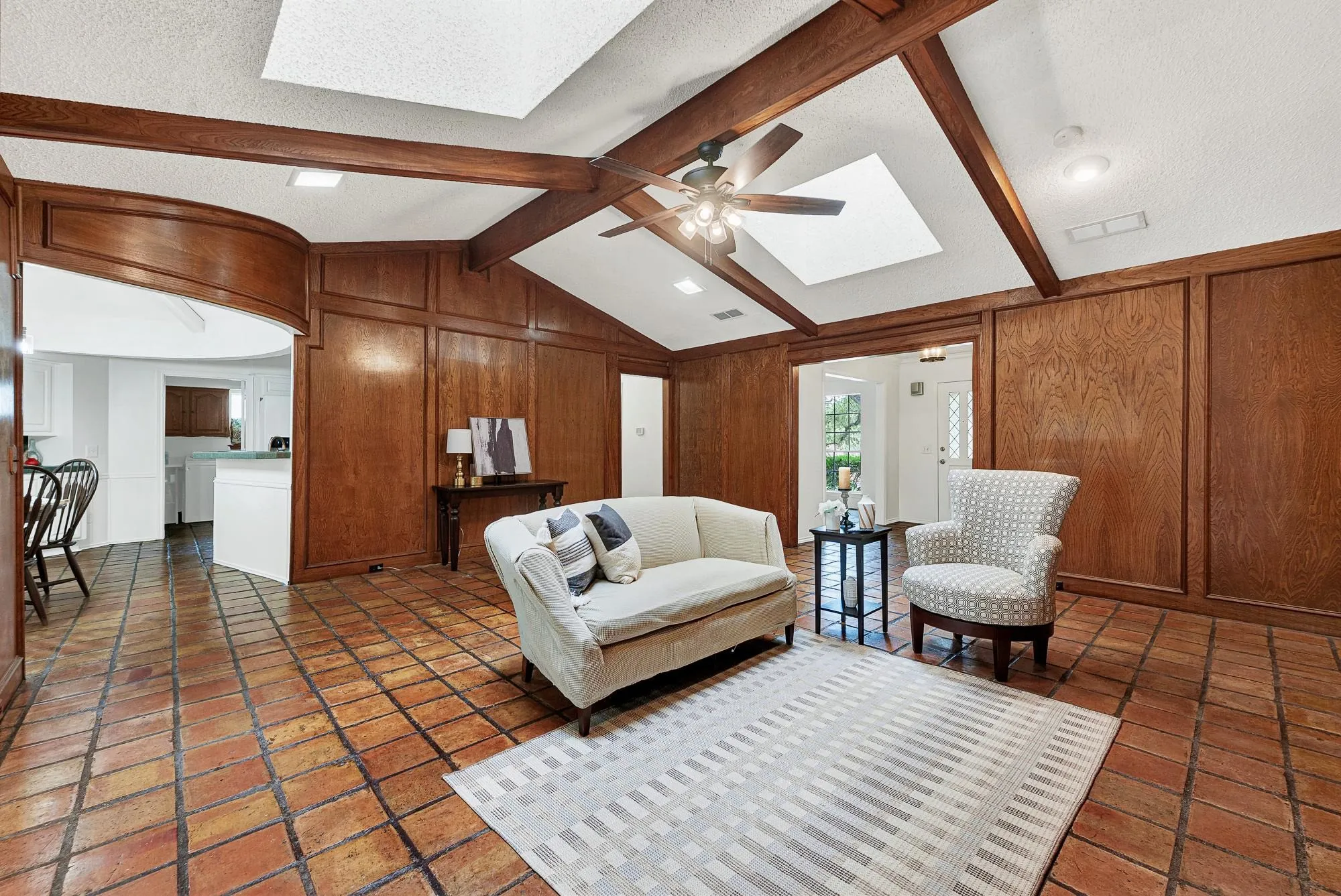 Open floor plan to the kitchen and sun room.