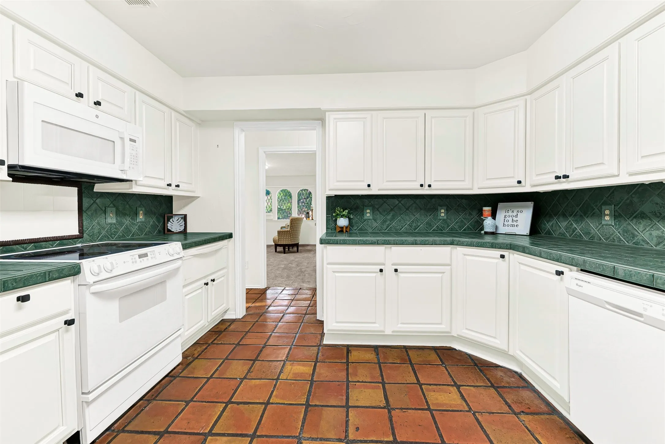 Easy access to play room, Dining room third bathroom. Durable Spanish tile floors