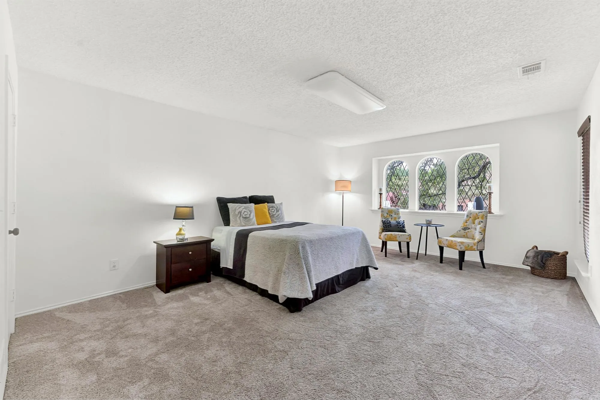 2nd Primary bedroom, large enough for a sitting area and desk space.