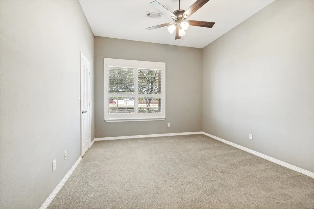 Bedroom #2. has Walk In Closet -Neutral Carpeting