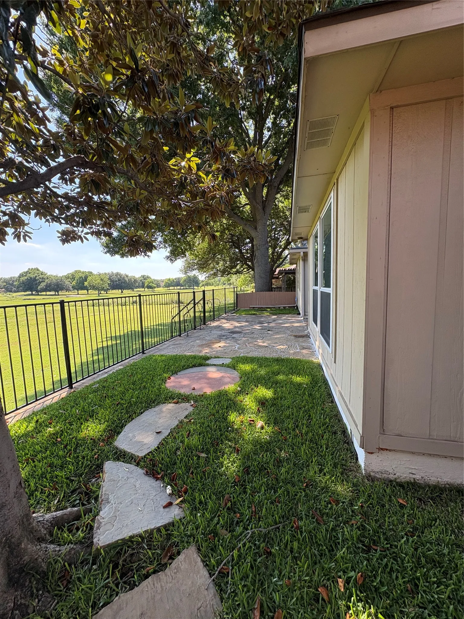 Path from side yard to back patio area