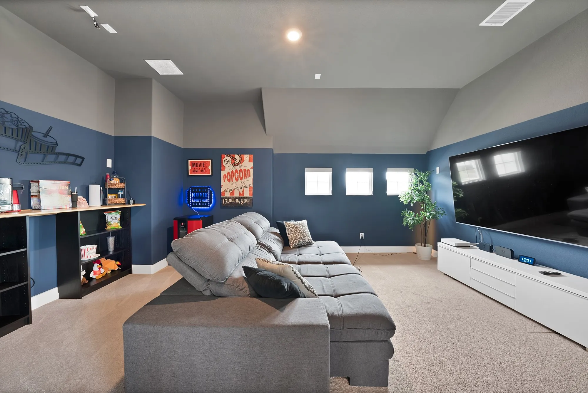 Versatile media room has so many options.  Media room, additional office, exercise room.
