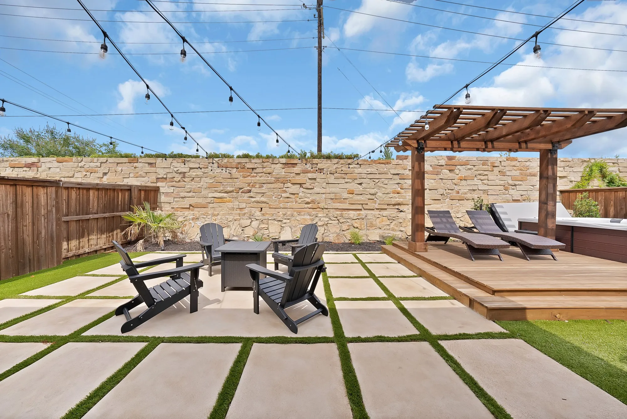 Serene outdoor fire pit area sets the stage for cozy evenings under the stairs.