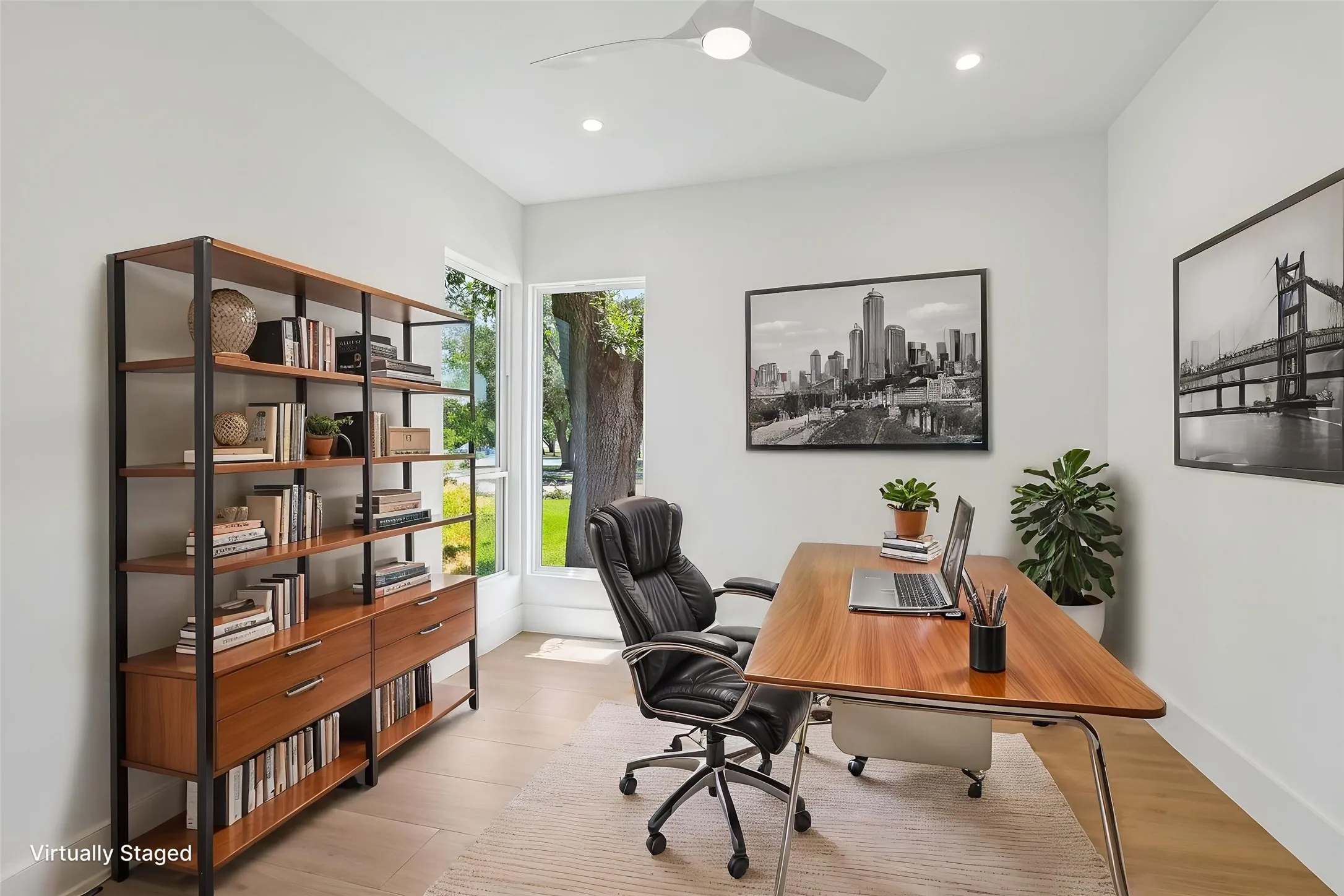 Dedicated workspace featuring wood-finish flooring and bright white walls