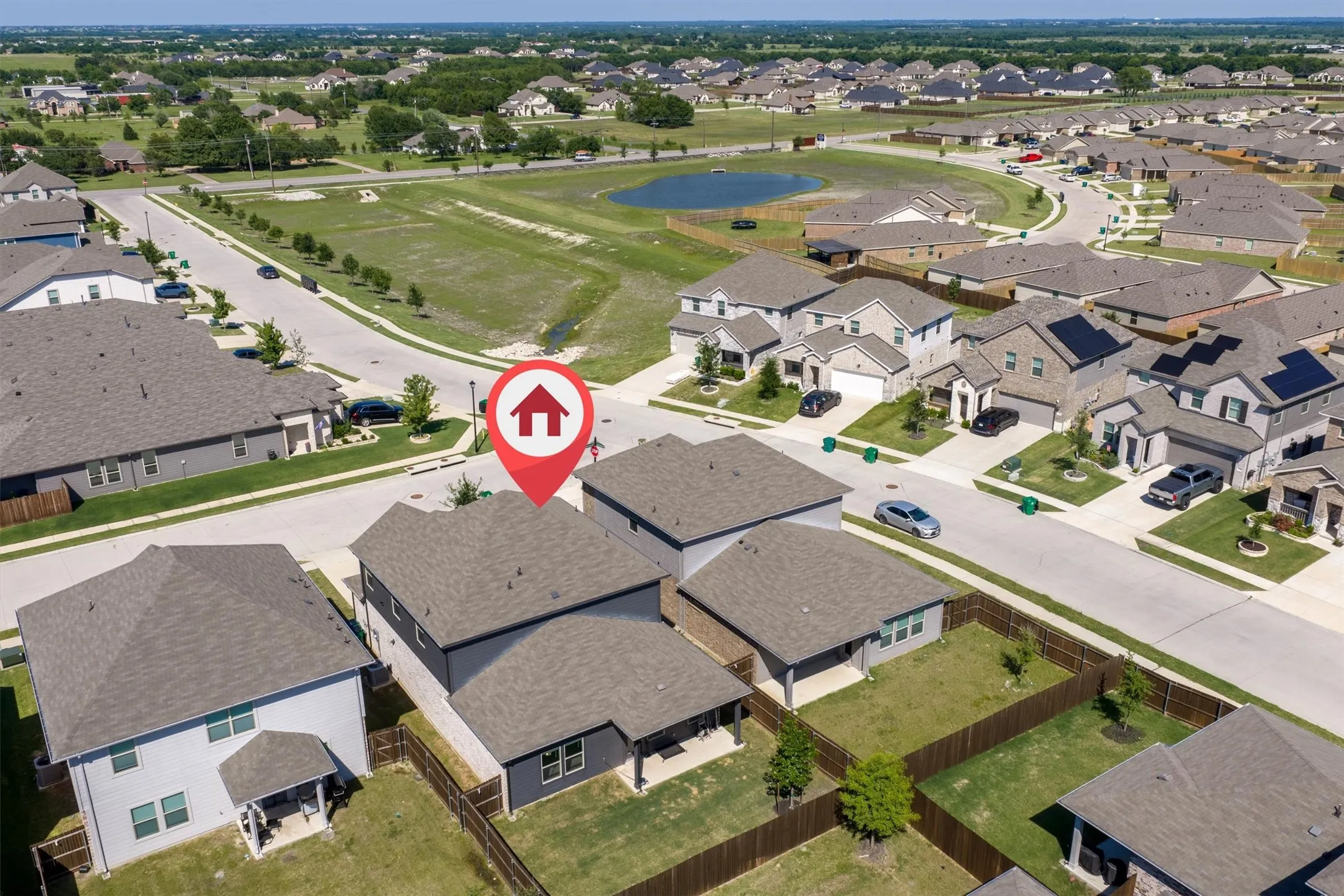 Aerial perspective showcasing a residential neighborhood with a variety of single-family homes