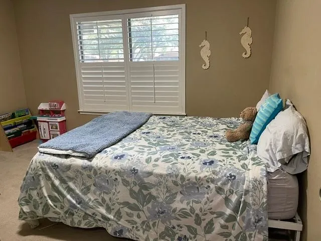 Third bedroom with less furniture