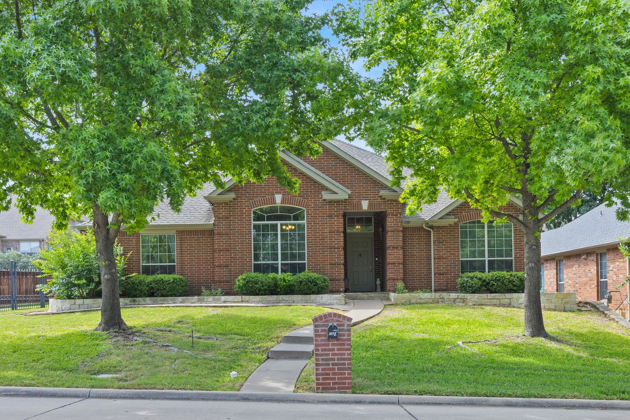 Brick exterior with a gabled roofline
