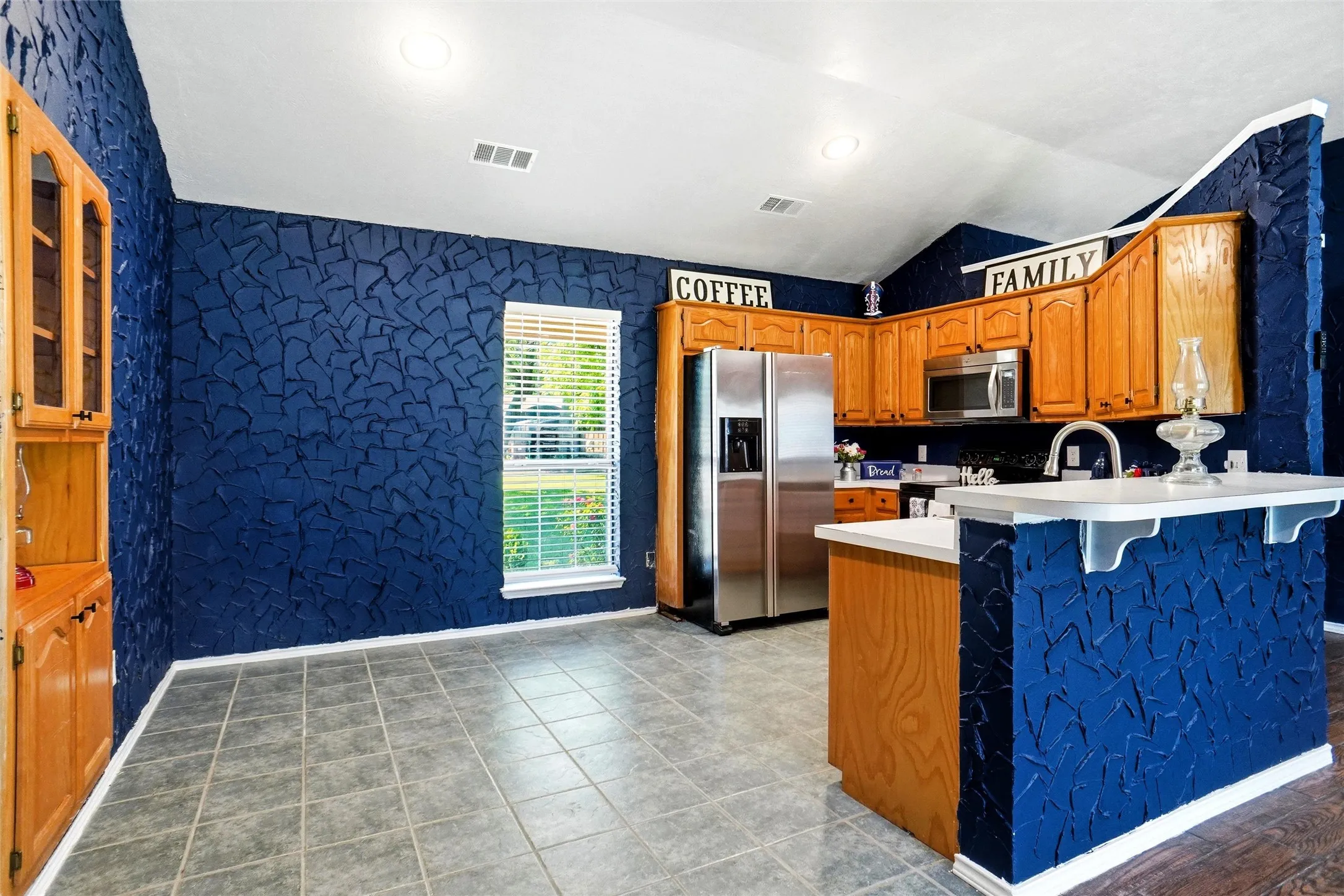 Step Into The Kitchen Dining Area. . .