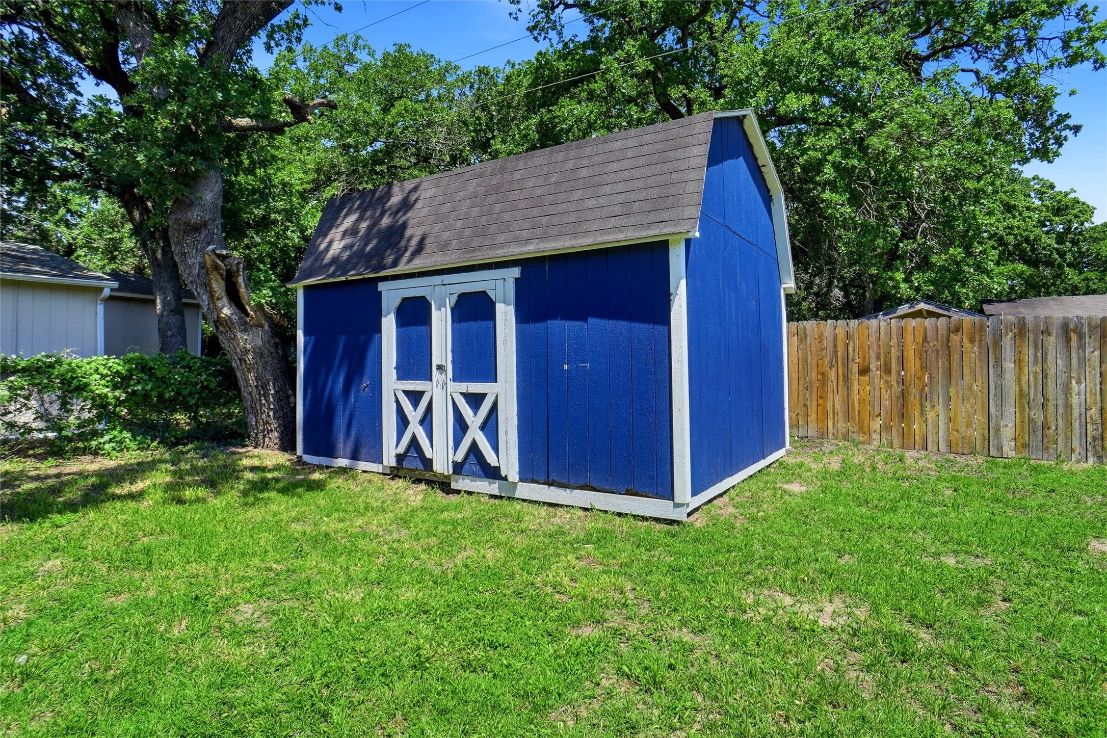 Close Up View of Out Building that Could Also Be a She Shed. . .