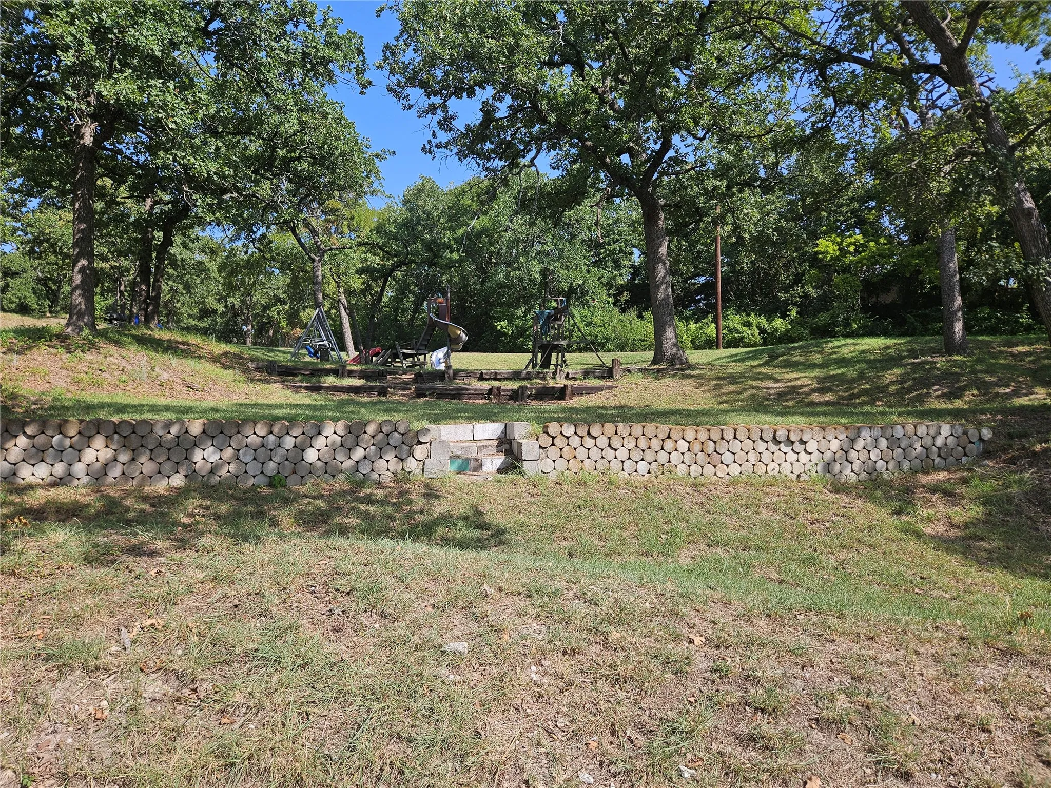 This Private Park For Only The Select Few has a Small Play Ground. . . .