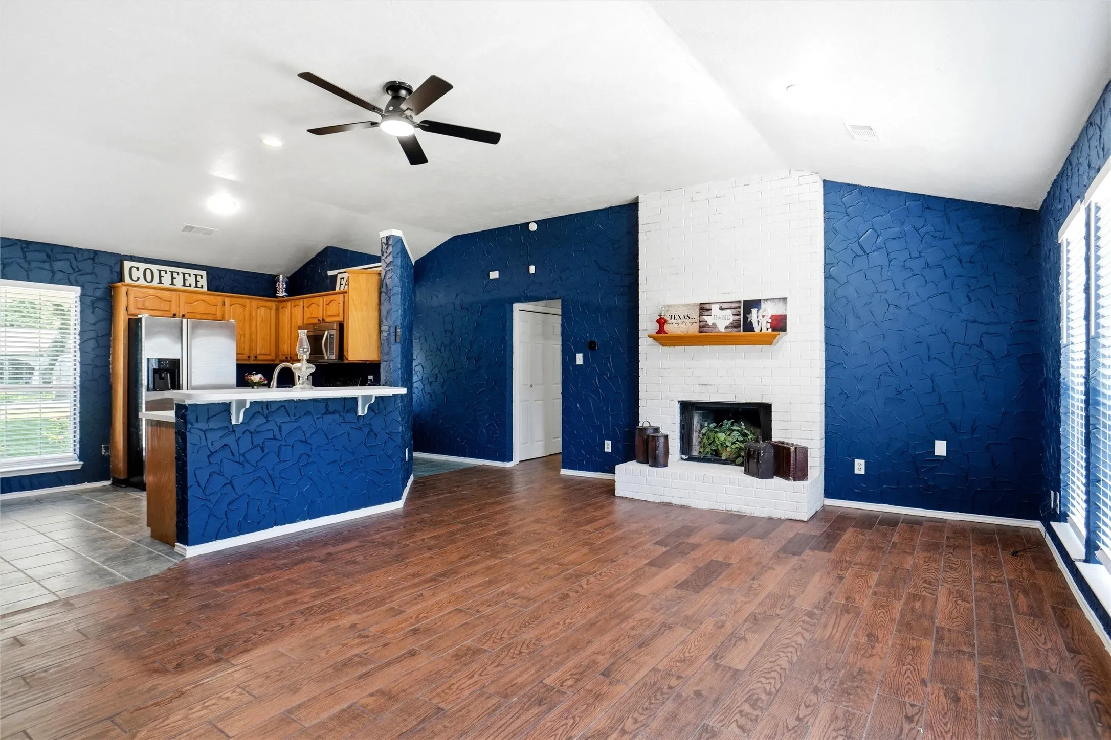 View From Back Door of Open Concept Living Kitchen and Dining