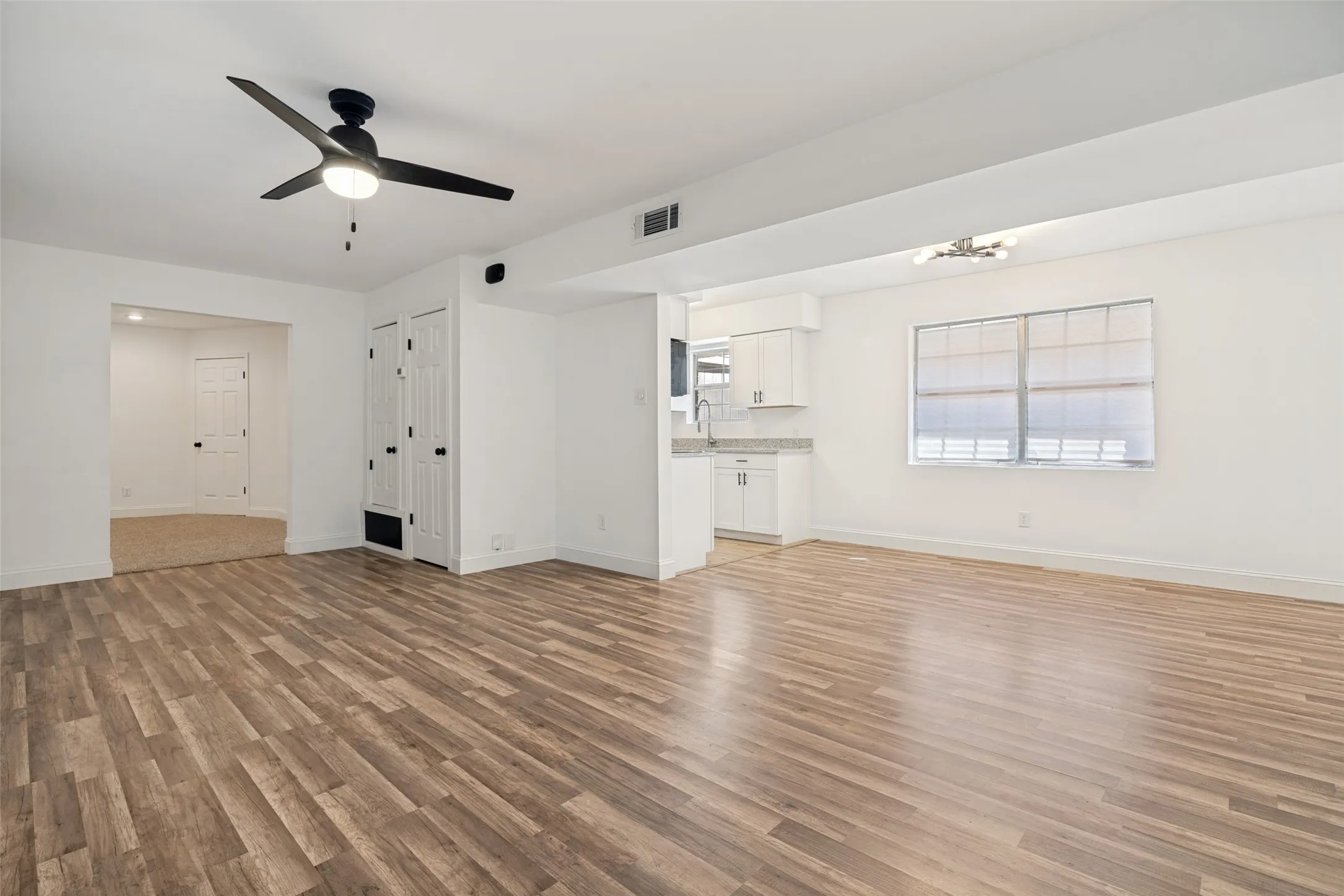 Living Room looking at kitchen and Family room
