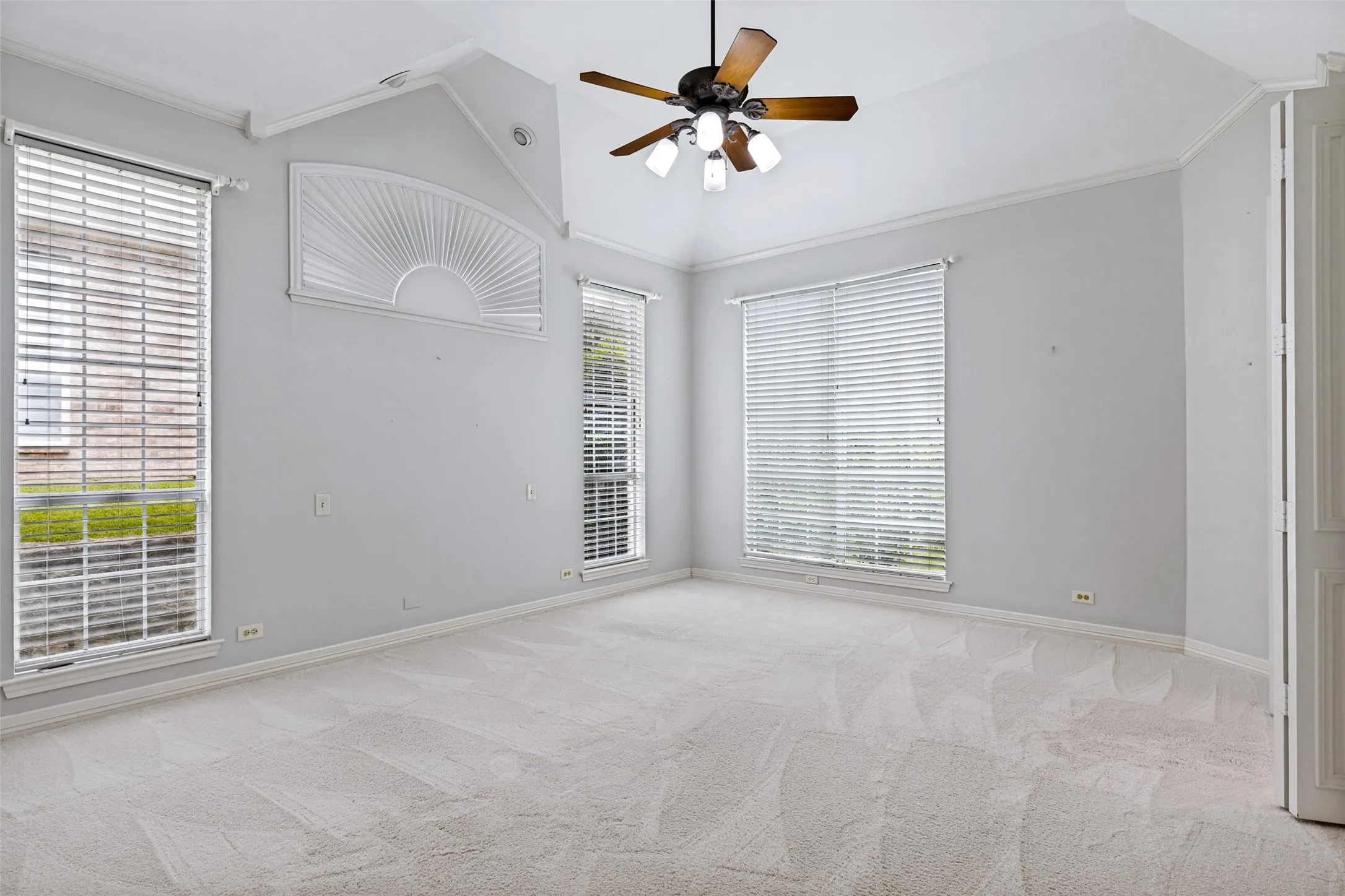 The primary retreat is private and located in the back, with high tiered ceiling detail, light and bright!