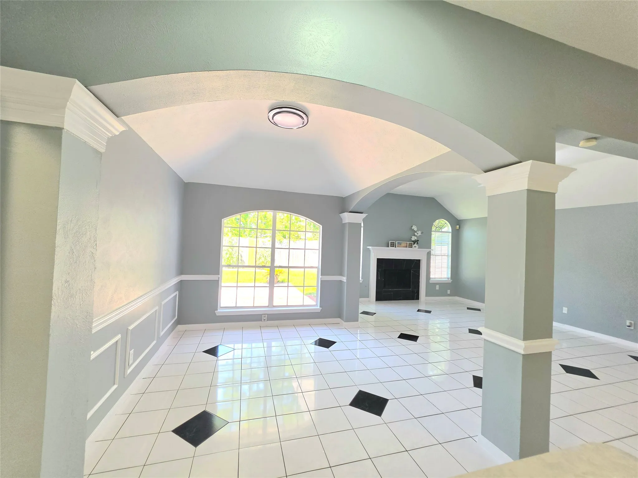 Vaulted ceilings with architectural archways and columns