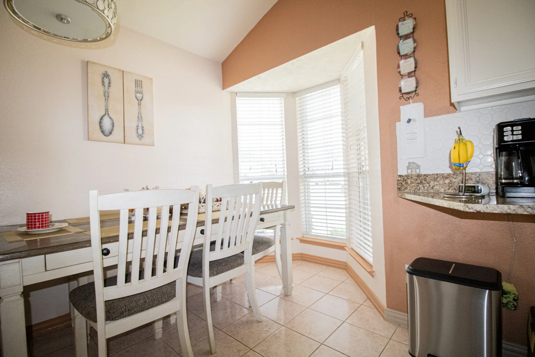 Dining area with vaulted ceiling