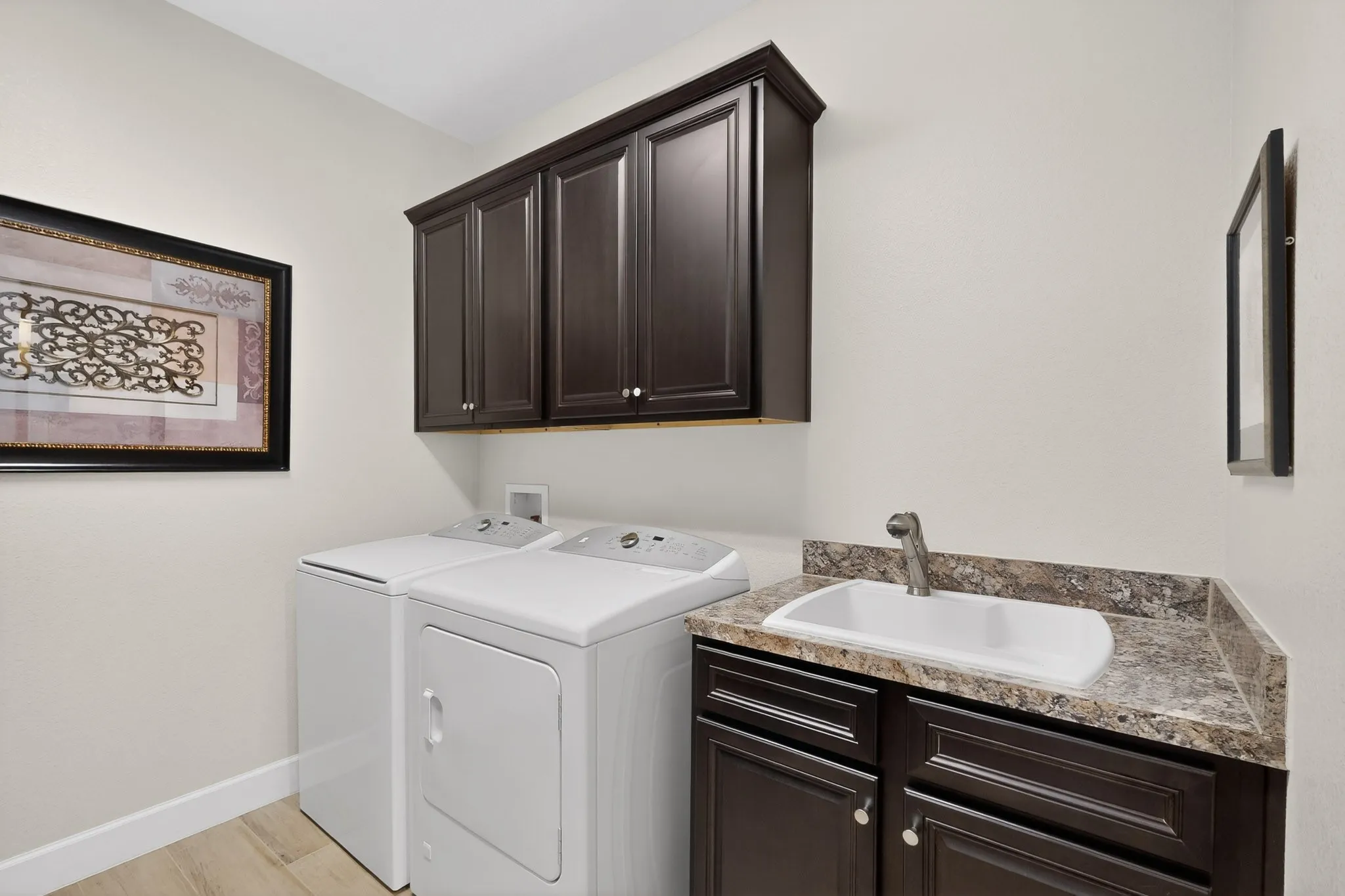 Laundry with built-ins on both sides.