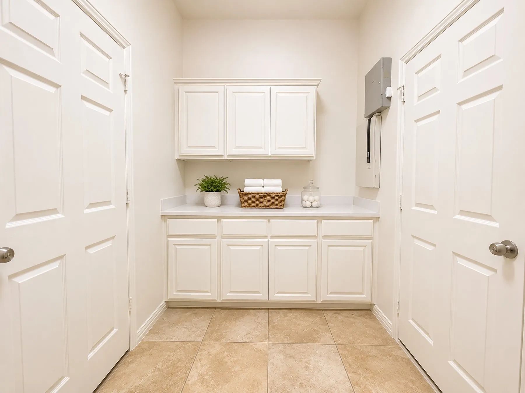 Utility area with large countertop and ample storage.