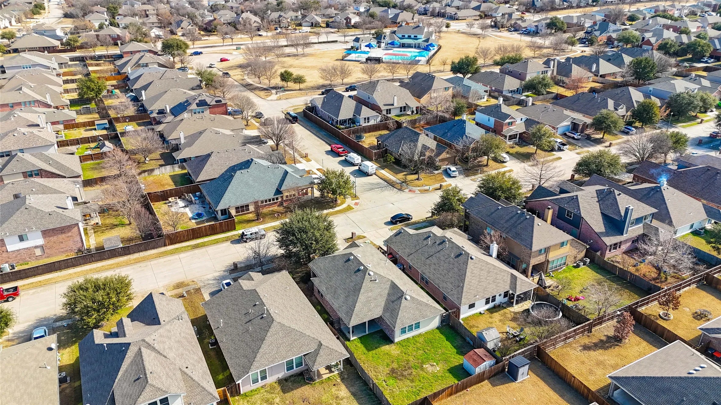 Aerial perspective showcasing a residential neighborhood with numerous single-family homes