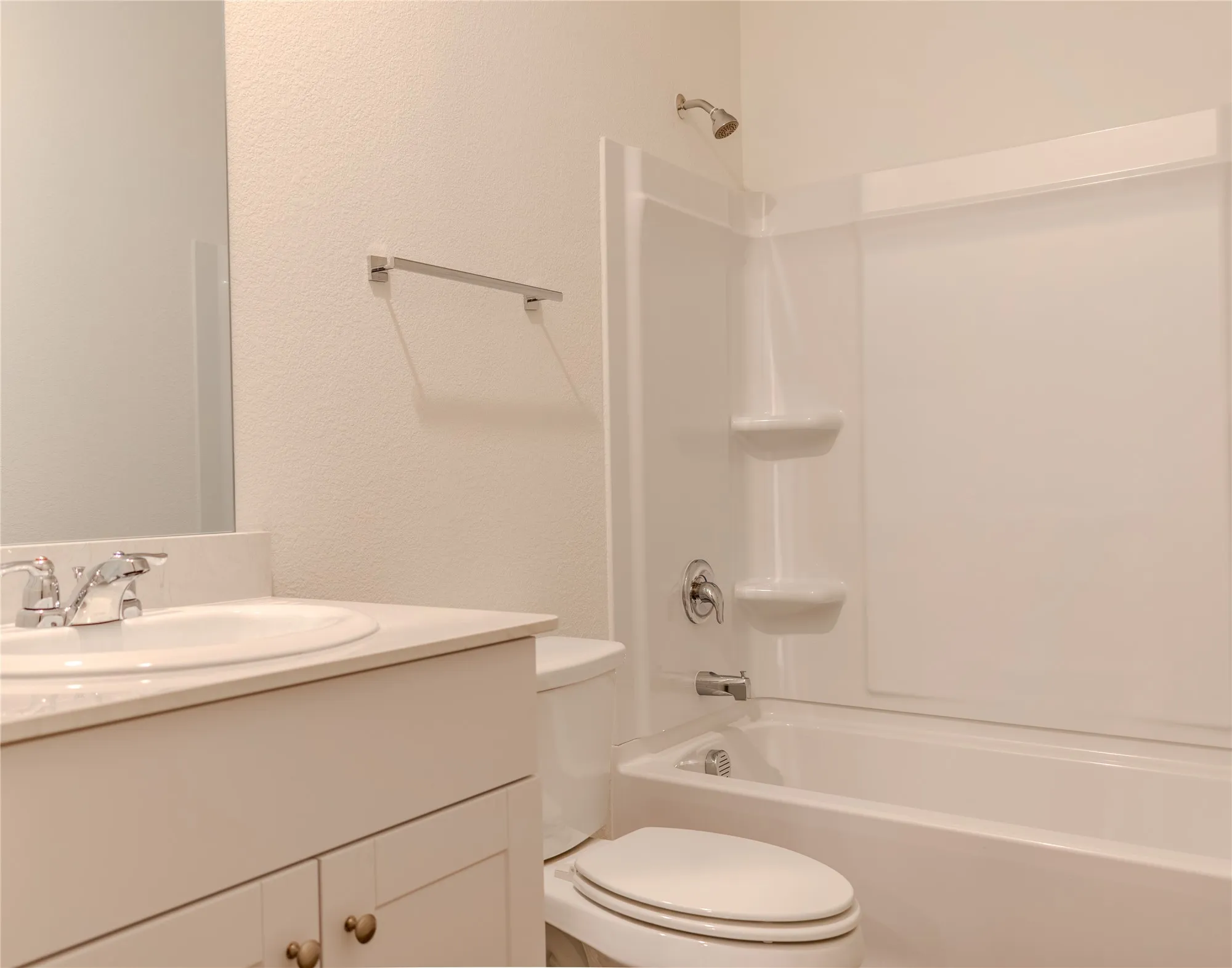 Full bathroom with vanity, toilet, and tub / shower combination