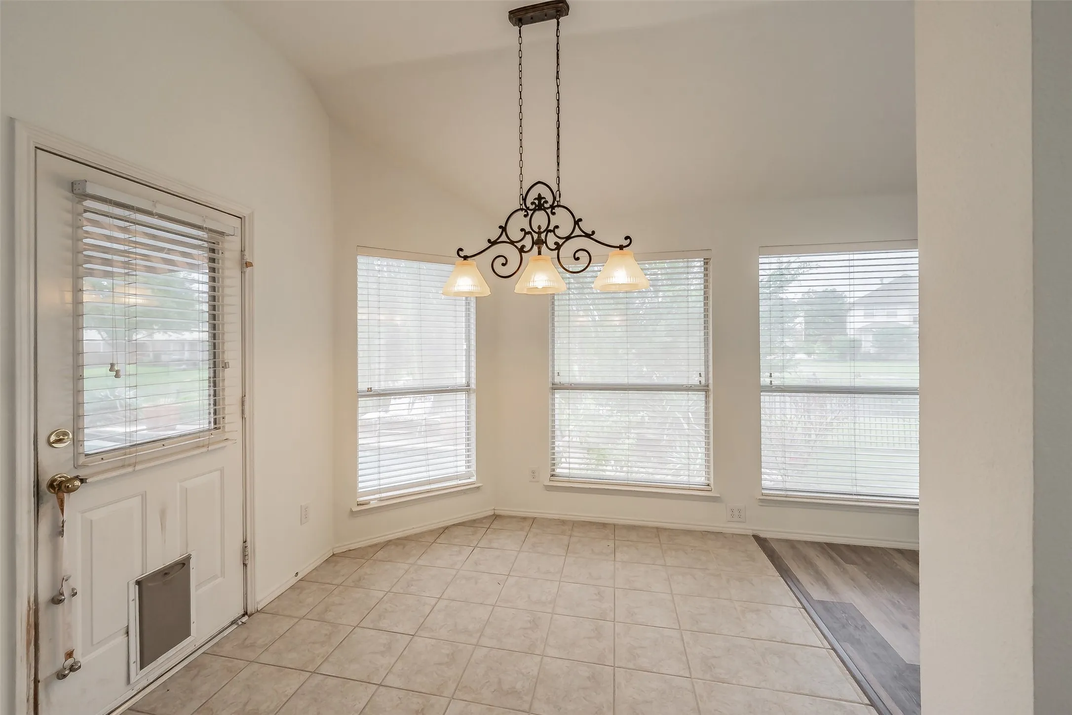 Breakfast area - door leading to pool/backyard
