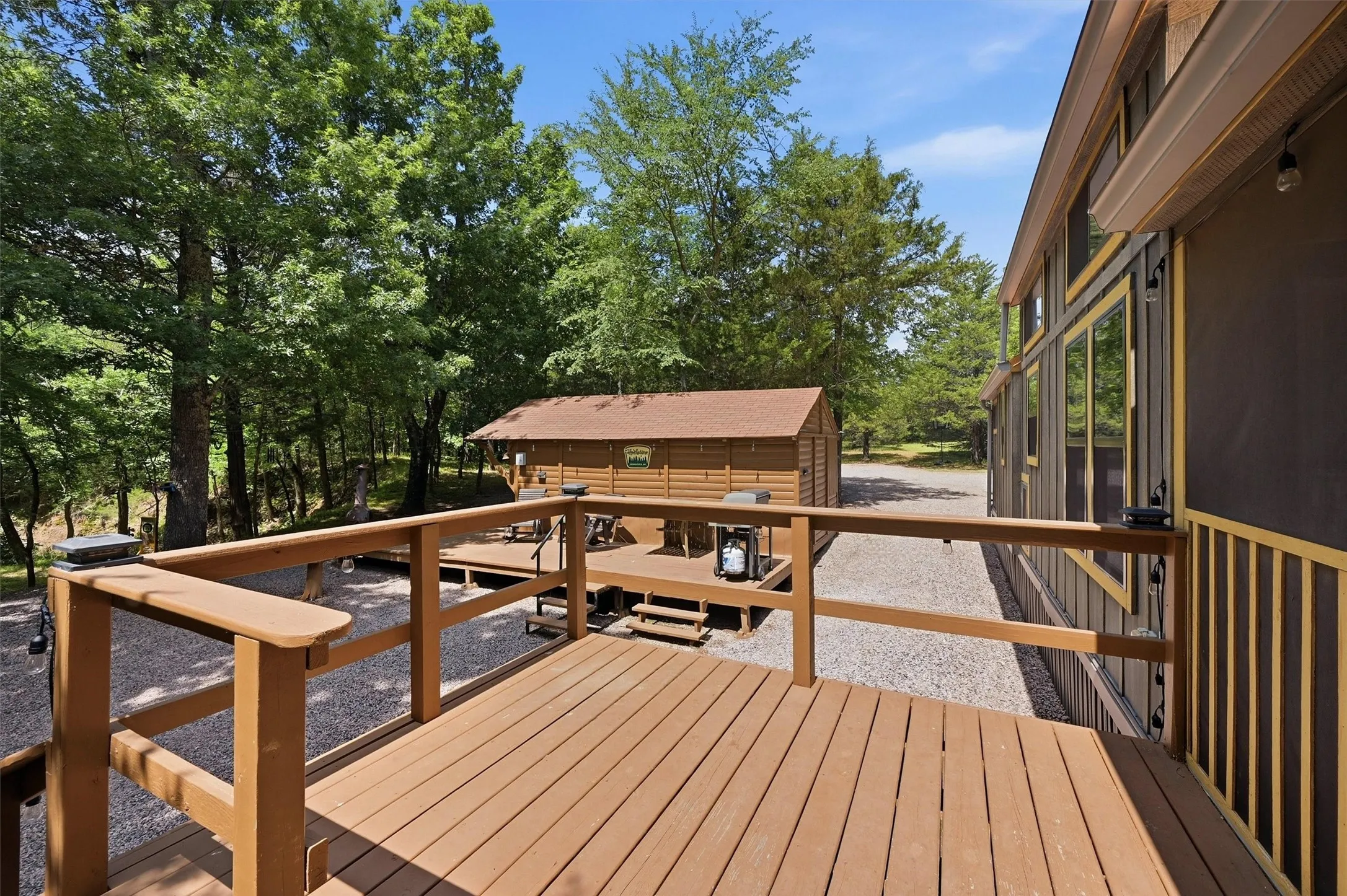 Expansive wood-finish decking with railings
