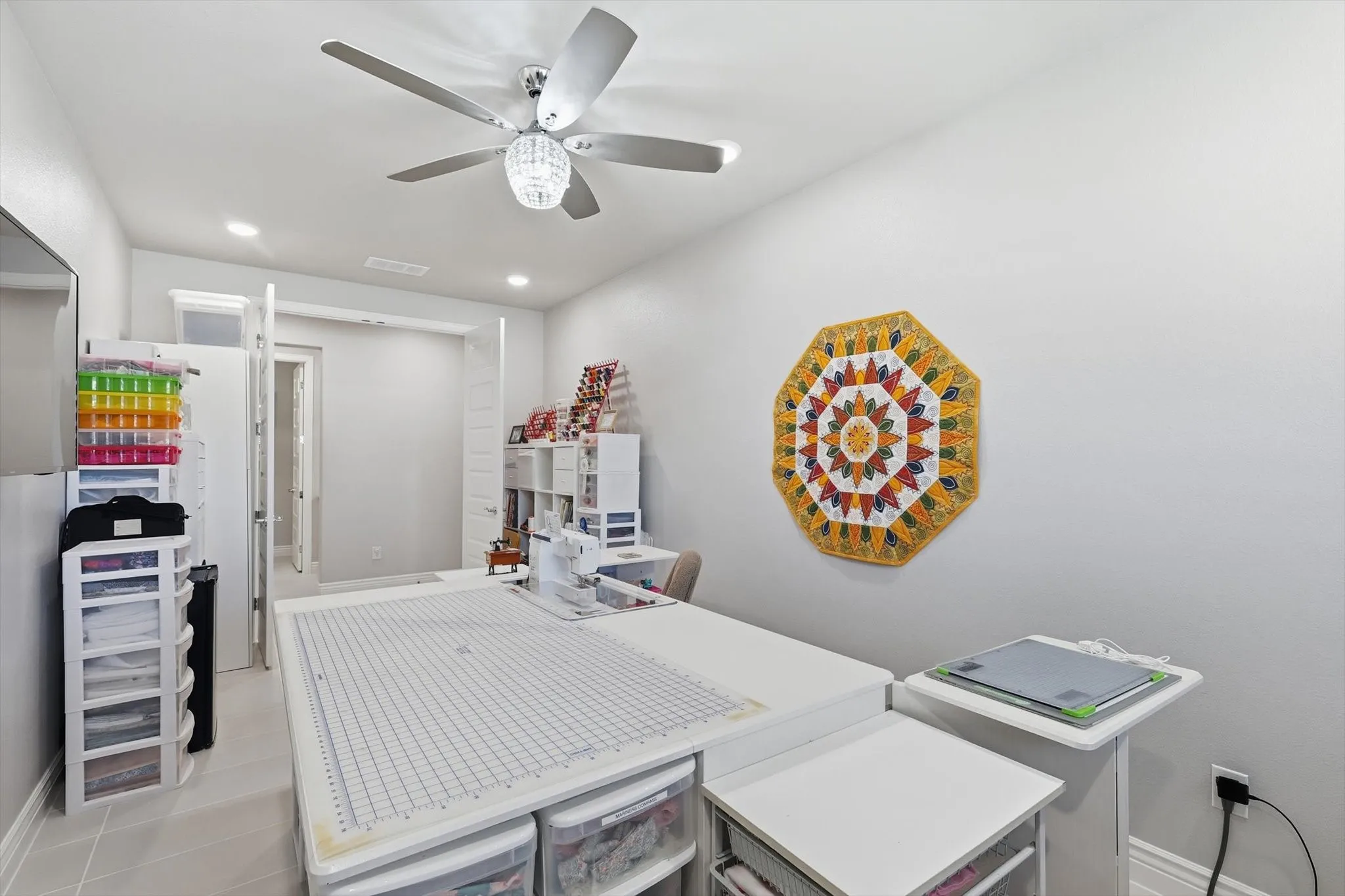 Interior room featuring light gray walls and tile flooring