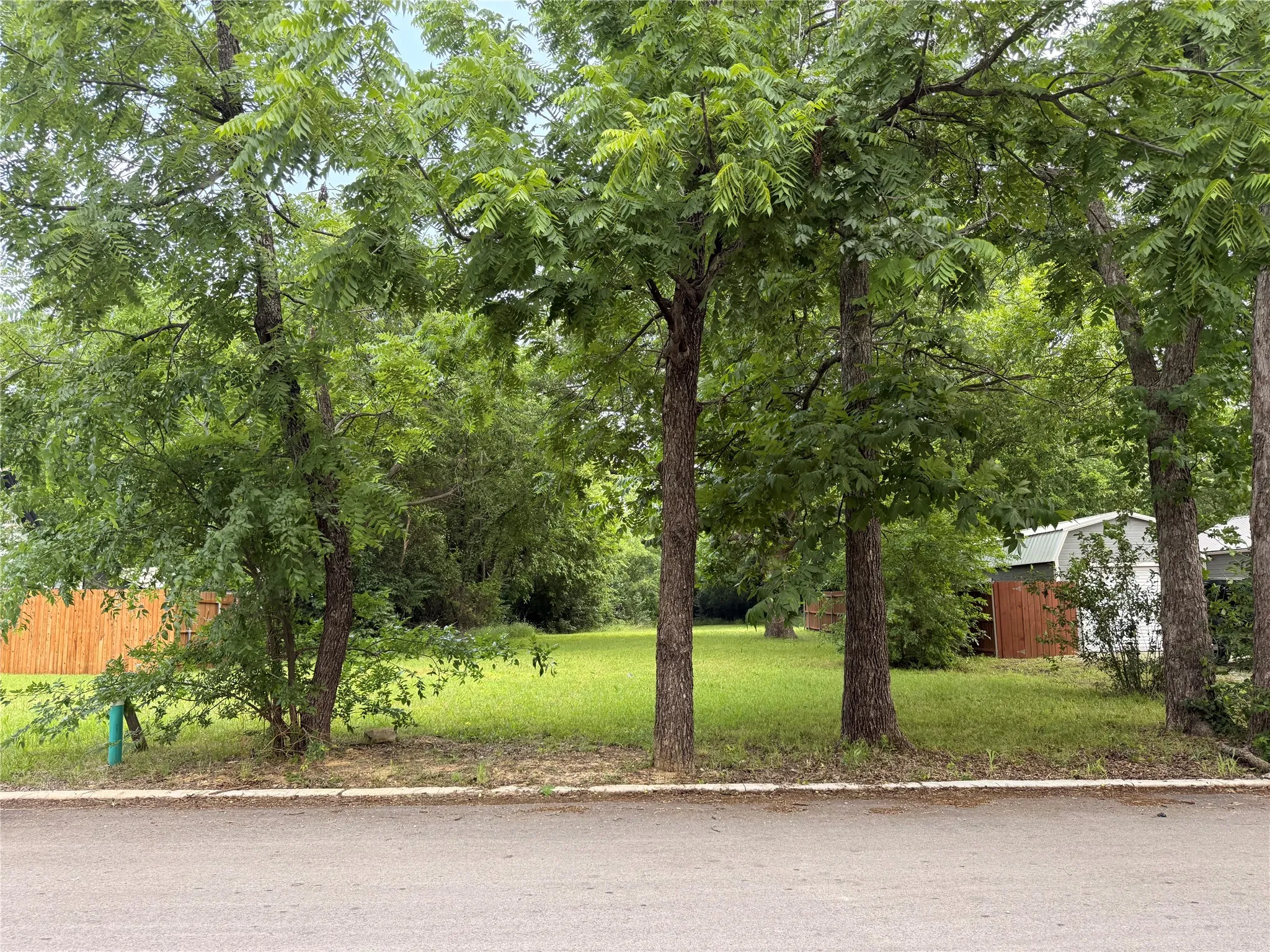 View of lot frontage from across the street.