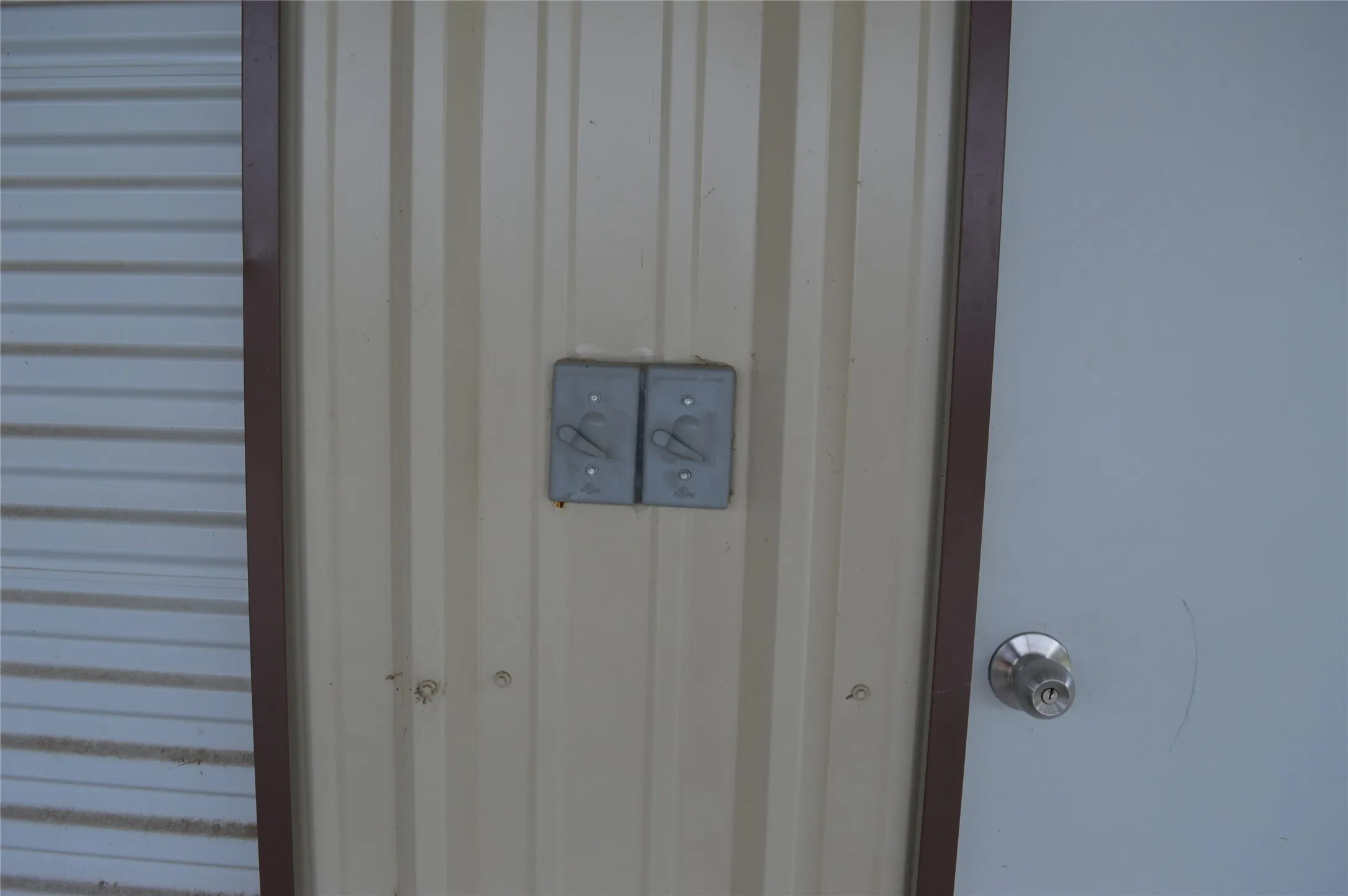 Electric Switches by front door of the shop turn on carport Ceiling Fan and light