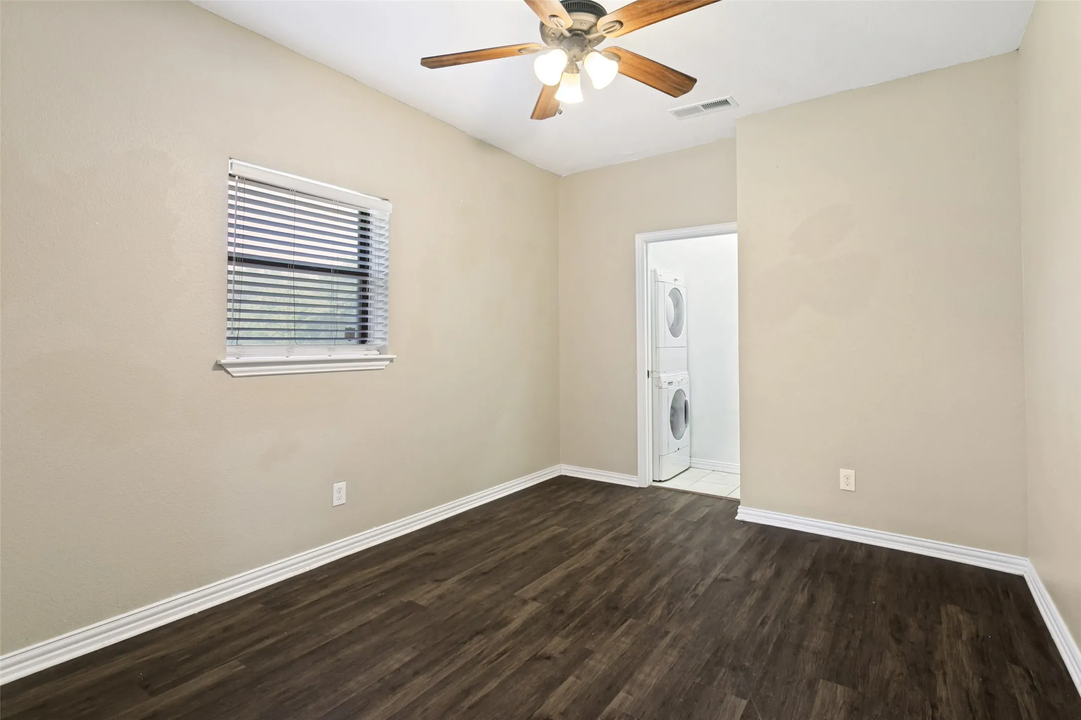 4th bedroom with en suite bath and utility room