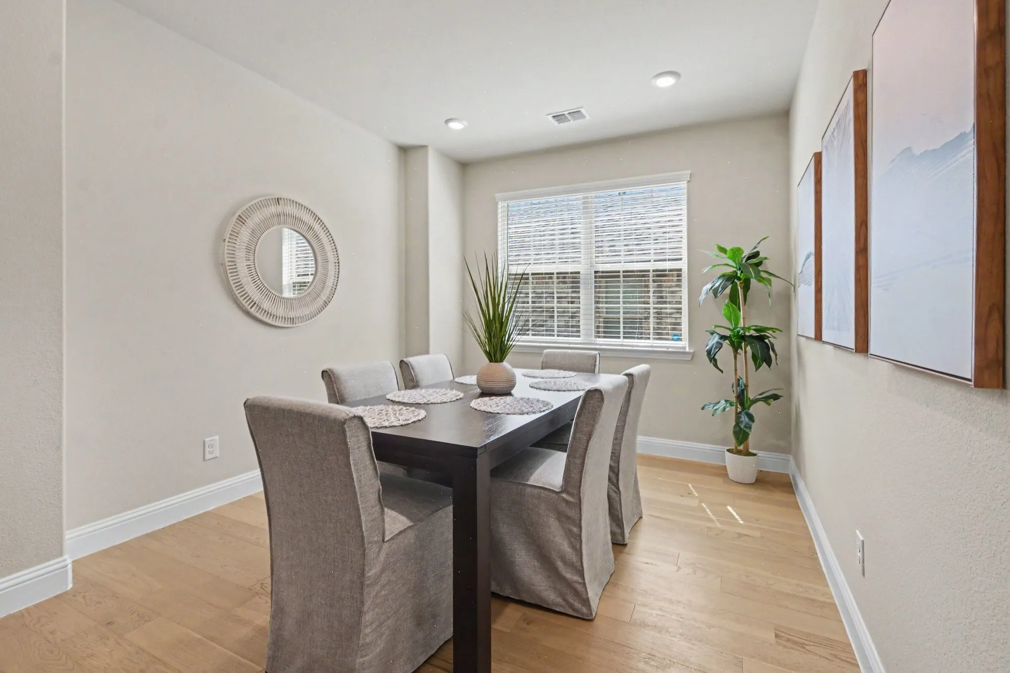 Recessed lighting, wood-finish flooring, and window with blinds