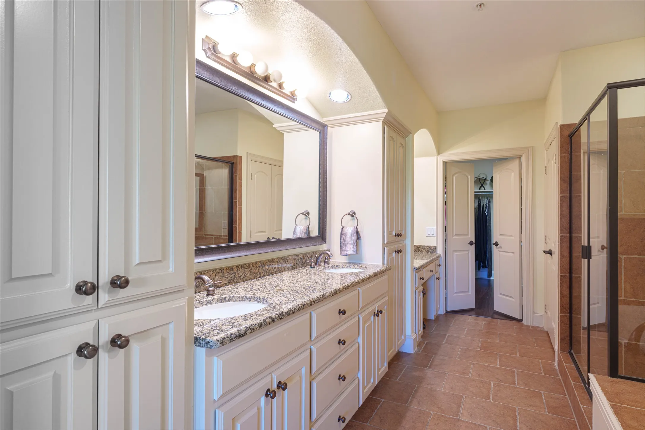 Dual Vanities, Abundant Cabinets & Granite Countertops