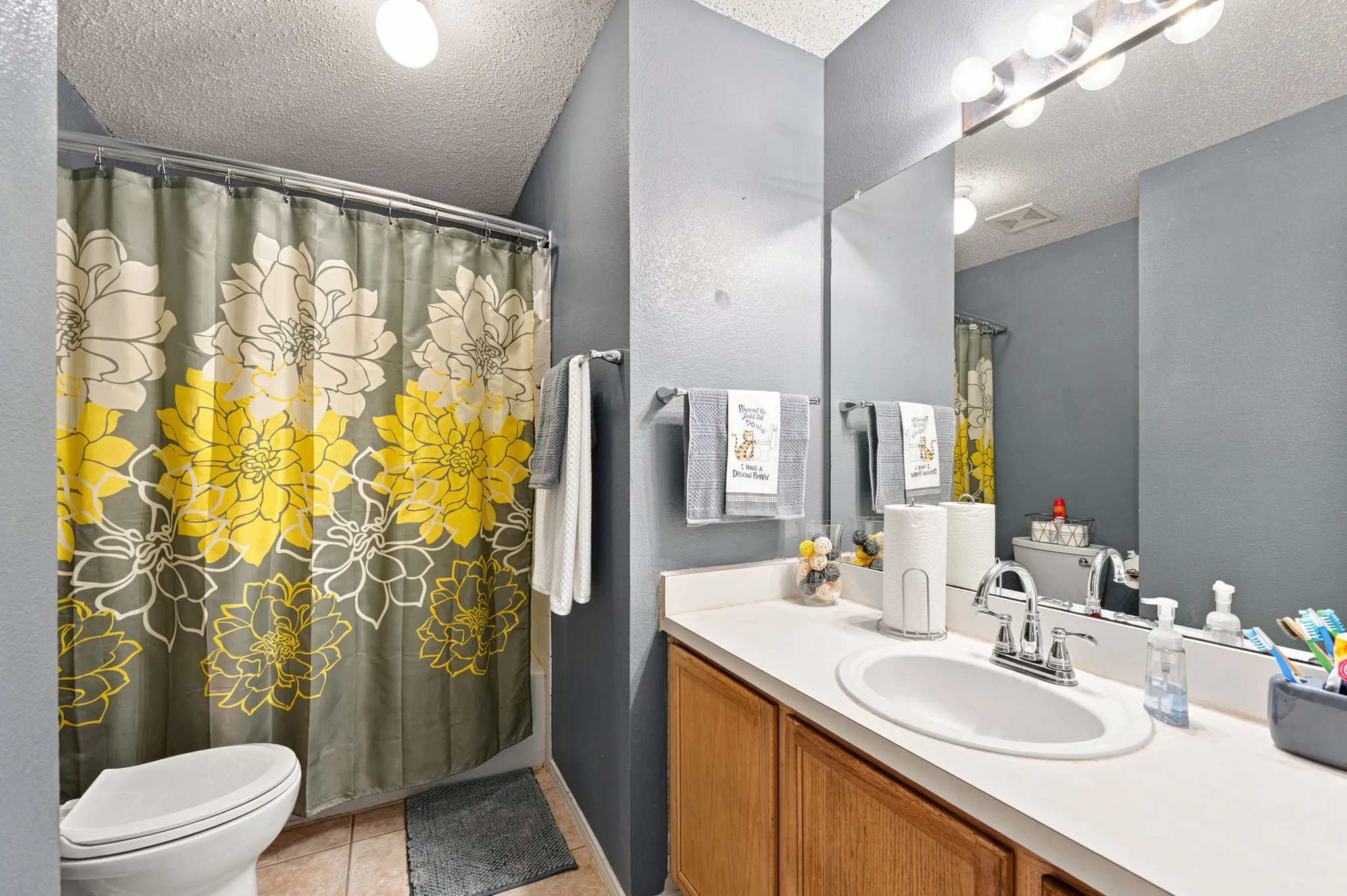 Hall bath for guests or occupants of secondary bedrooms.