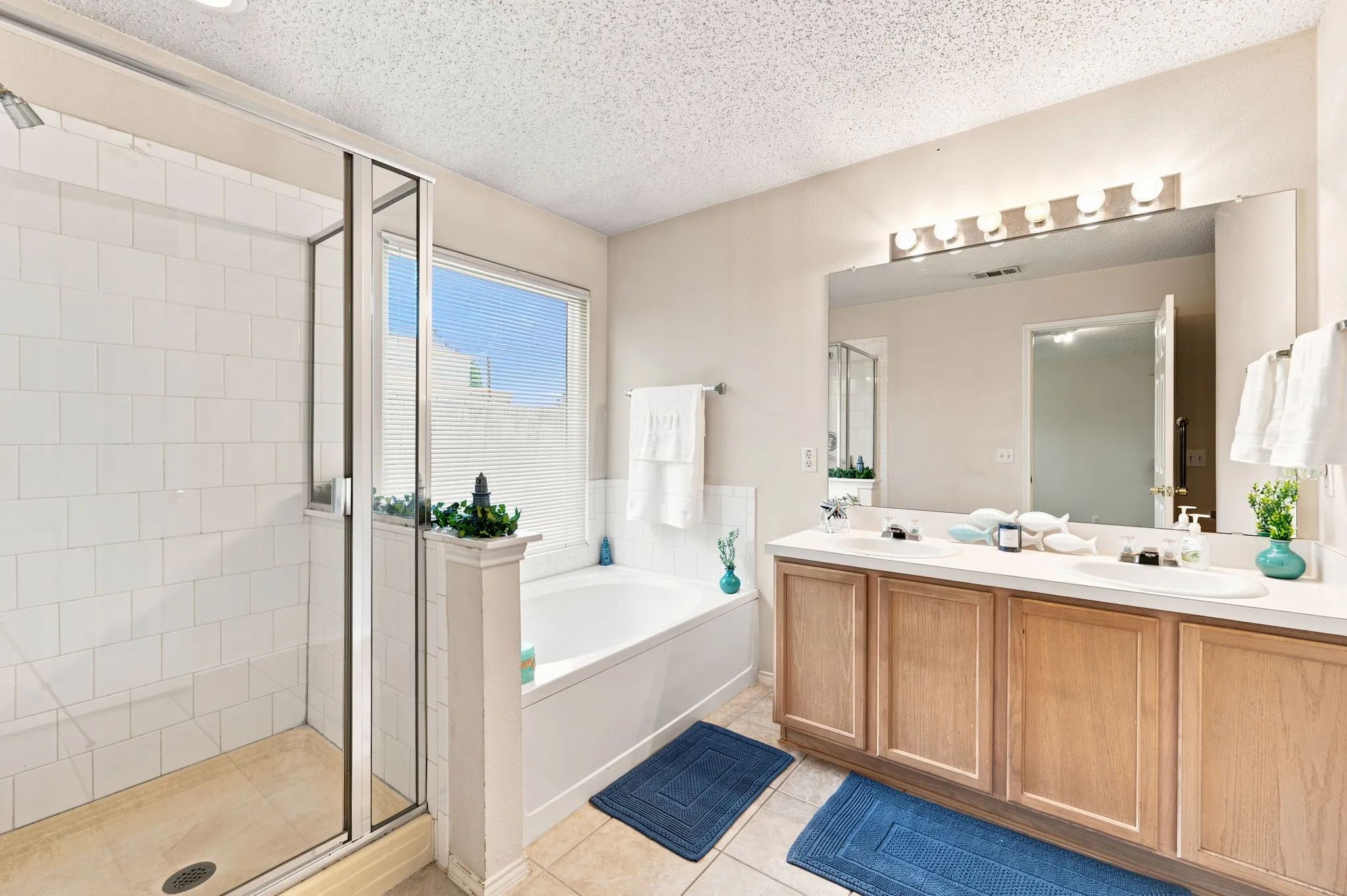 Master Ensuite bath with oversized separate shower and tub.  Double sinks and large vanity.