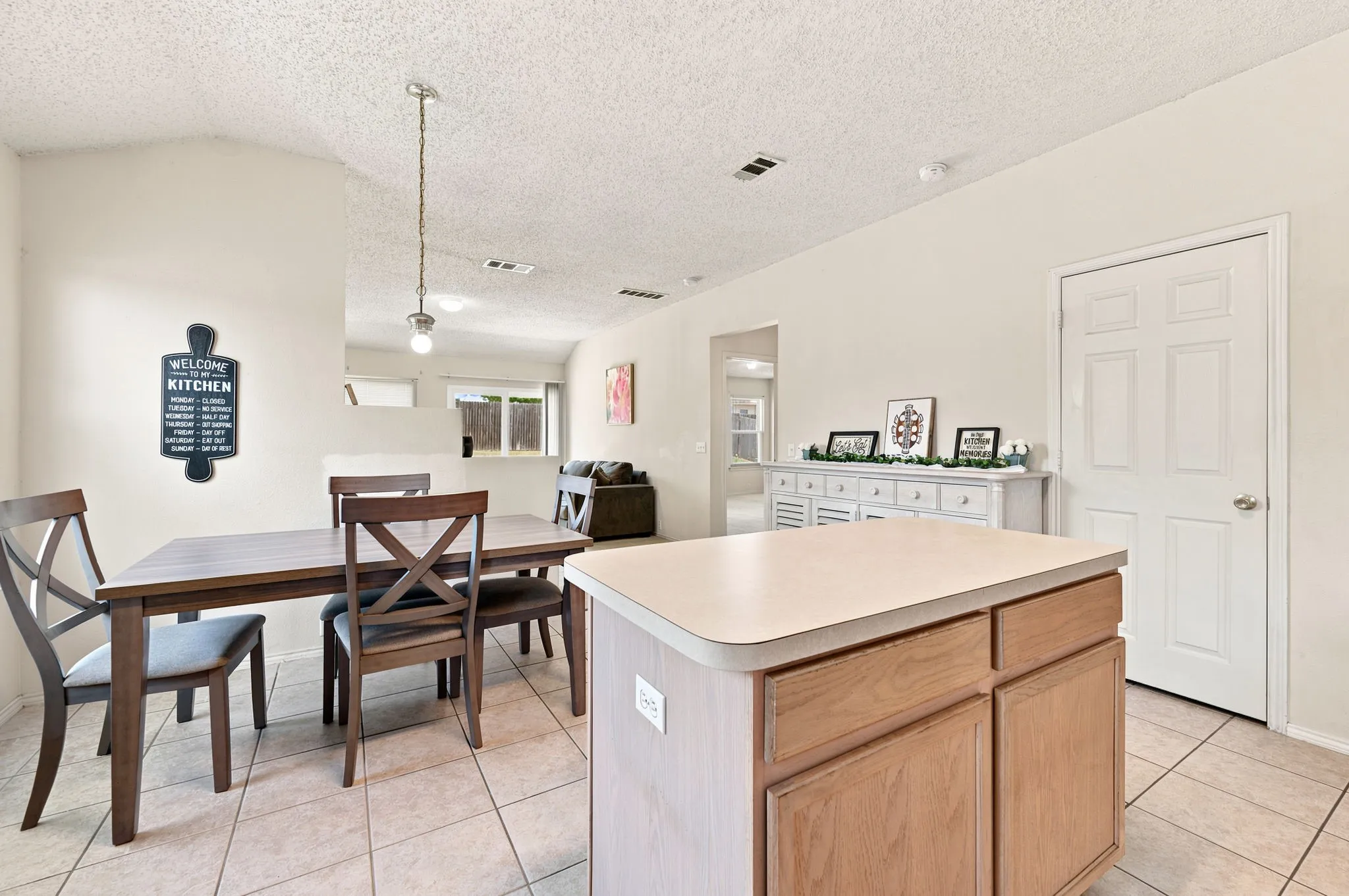 Dining area is conveniently located nearby the kitchen.  Generous space!