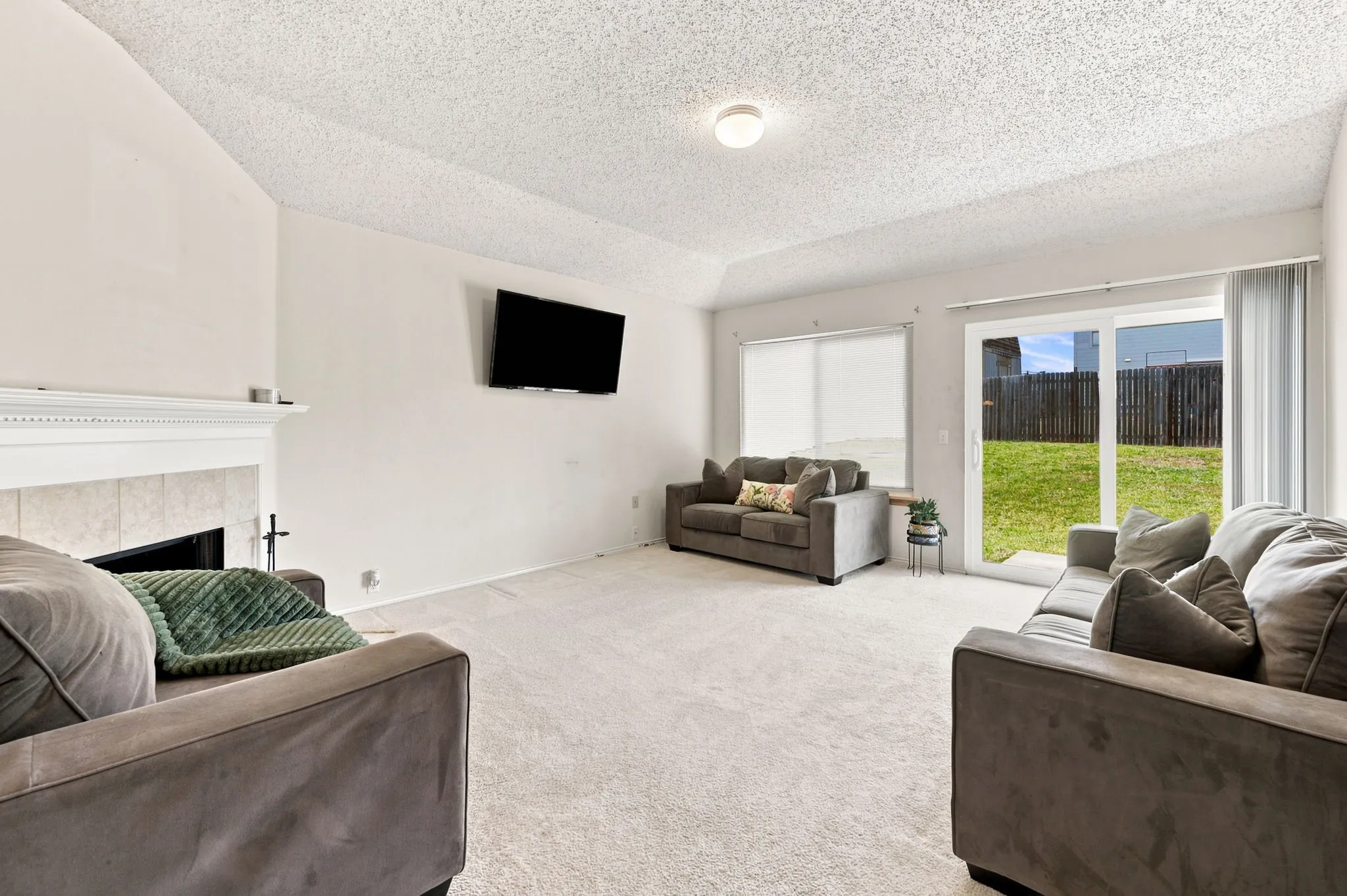 NEW PELLA SLIDING DOOR with screens for fresh air or easy access to backyard.