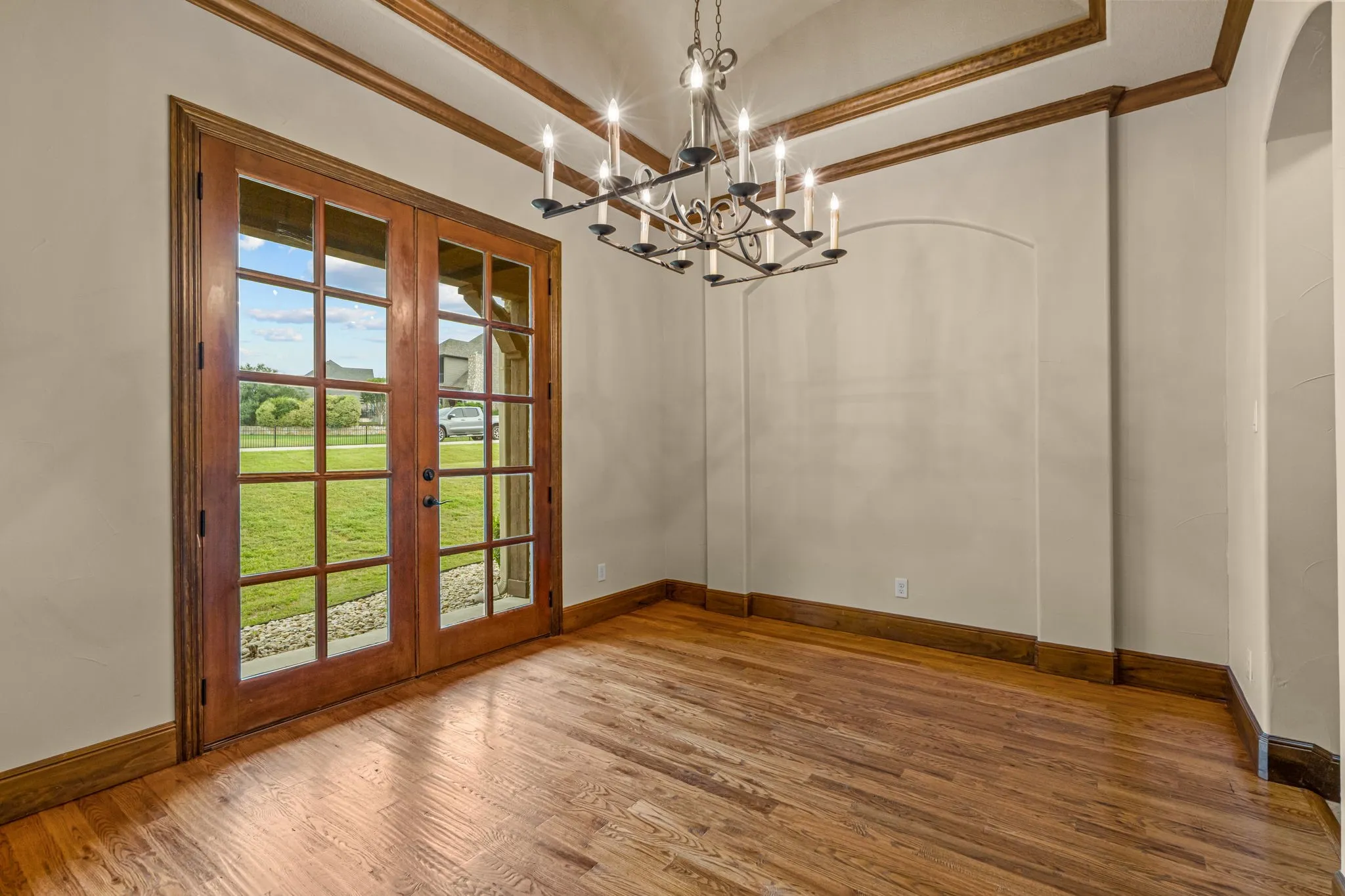 Dining area with double doors to the f