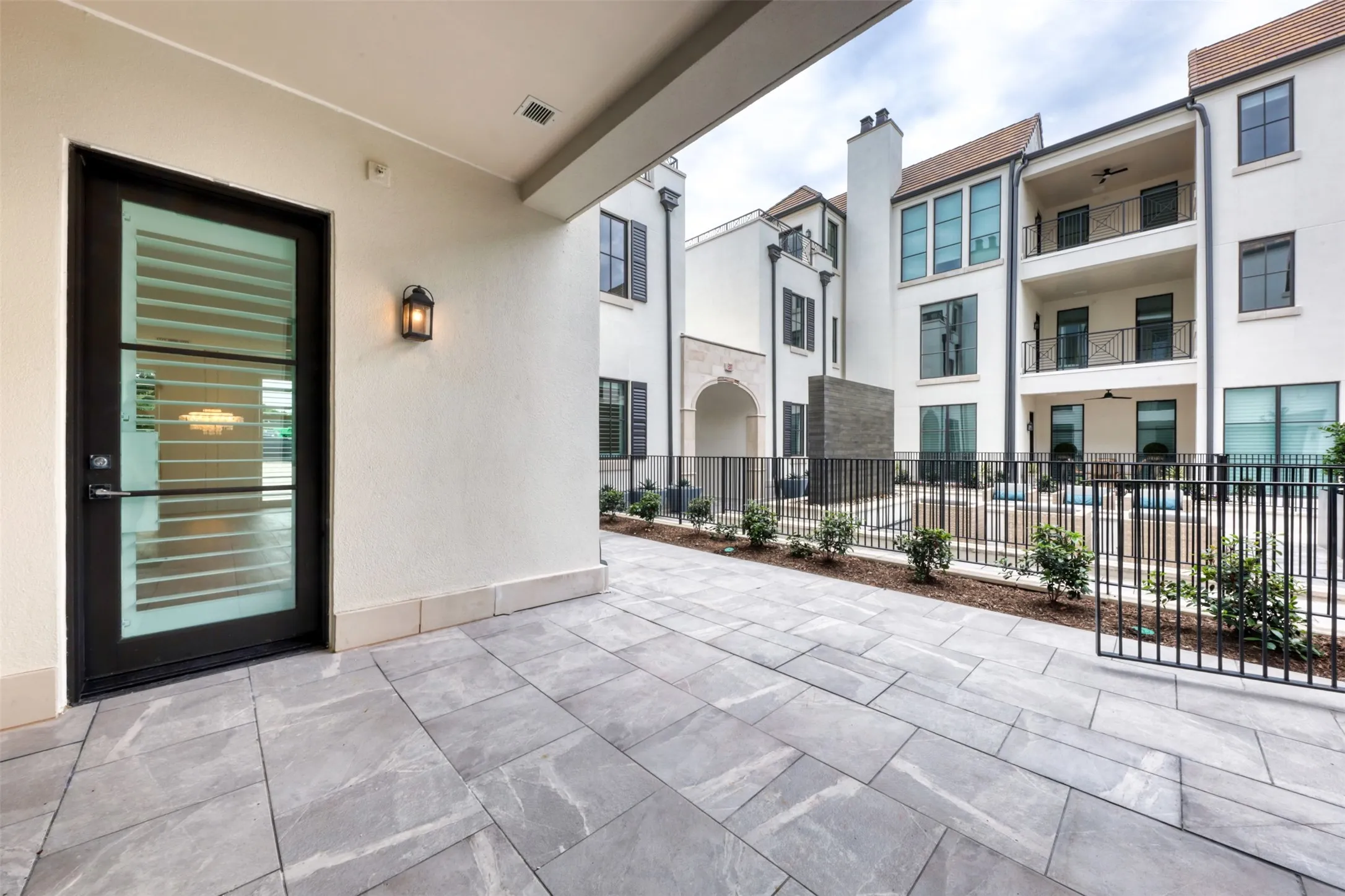 Easy access to outdoor living, cooking center and putting green