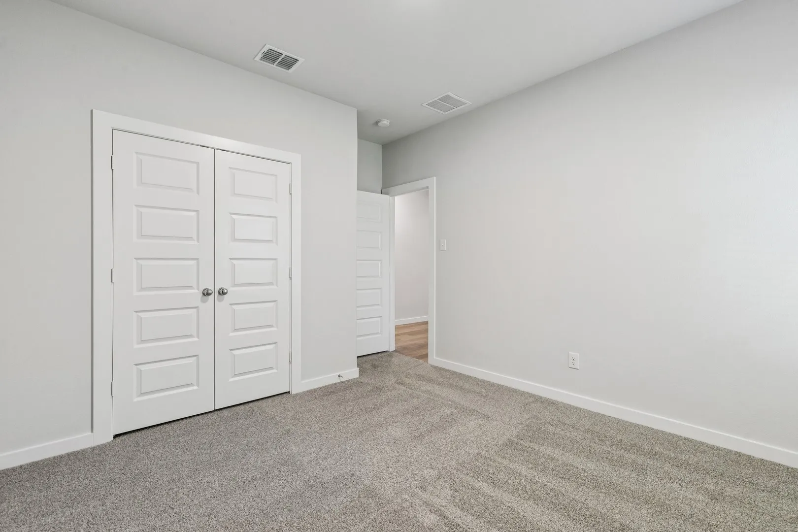 Bedroom in the Oscar home plan by Trophy Signature Homes – REPRESENTATIVE PHOTO