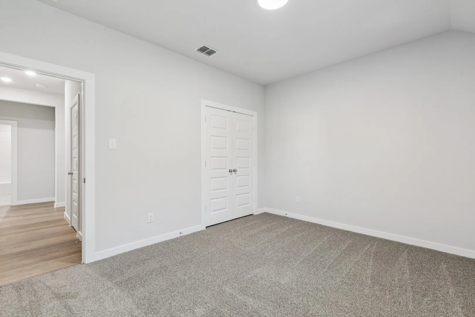 Bedroom in the Oscar home plan by Trophy Signature Homes – REPRESENTATIVE PHOTO