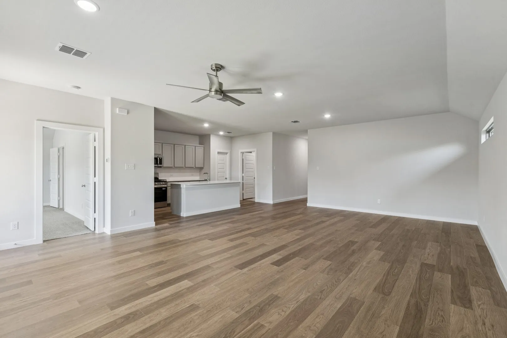 Open Floor Plan in the Oscar home plan by Trophy Signature Homes – REPRESENTATIVE PHOTO
