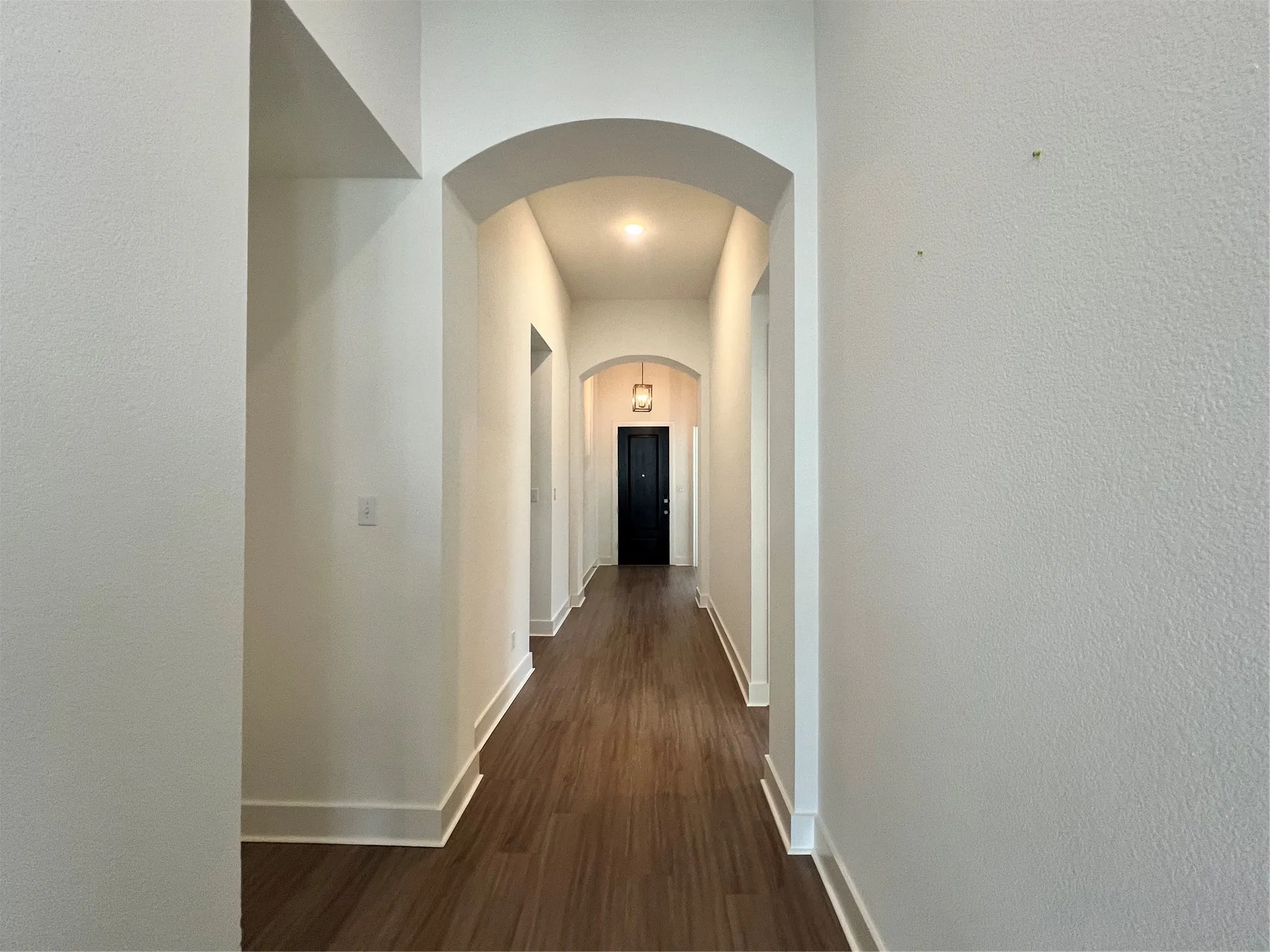 Beautiful wide entry hall with tall ceilings.
