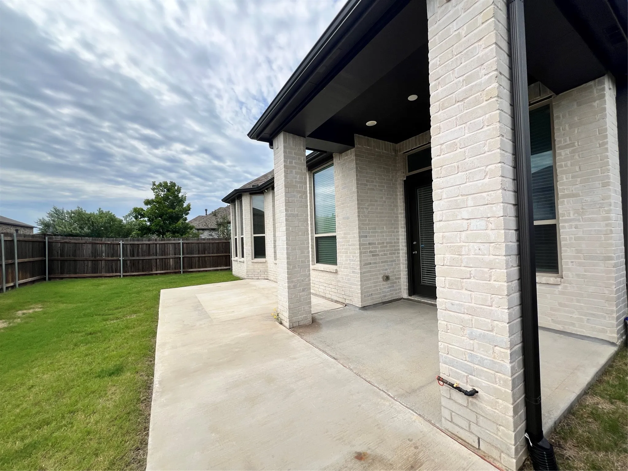 Outdoor patio with gasoline for grilling.